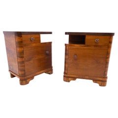 Art Deco walnut bedside tables, mid-20th century, Poland.