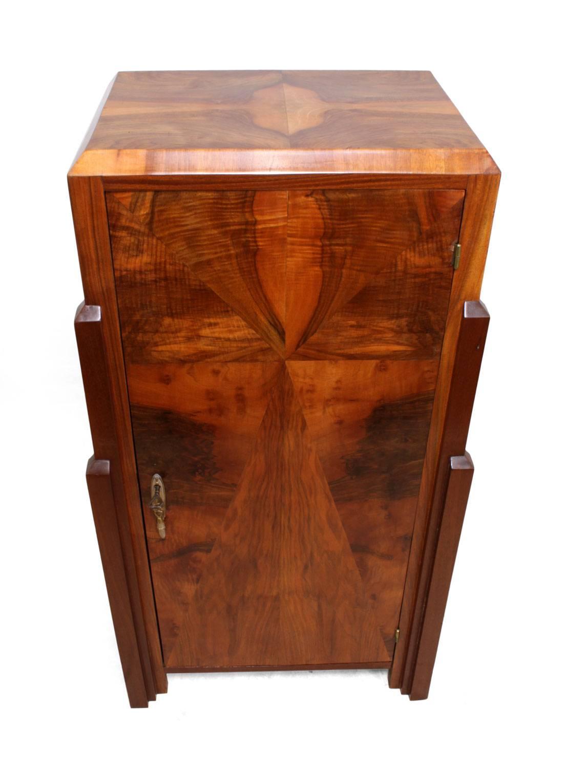 Art Deco walnut cabinet, circa 1930

This Art Deco single door walnut cabinet with shelves behind fully restored and polished and in very good condition

Age: 1930

Style: Art Deco

Material: Walnut

Condition: Very good

Dimensions: 106