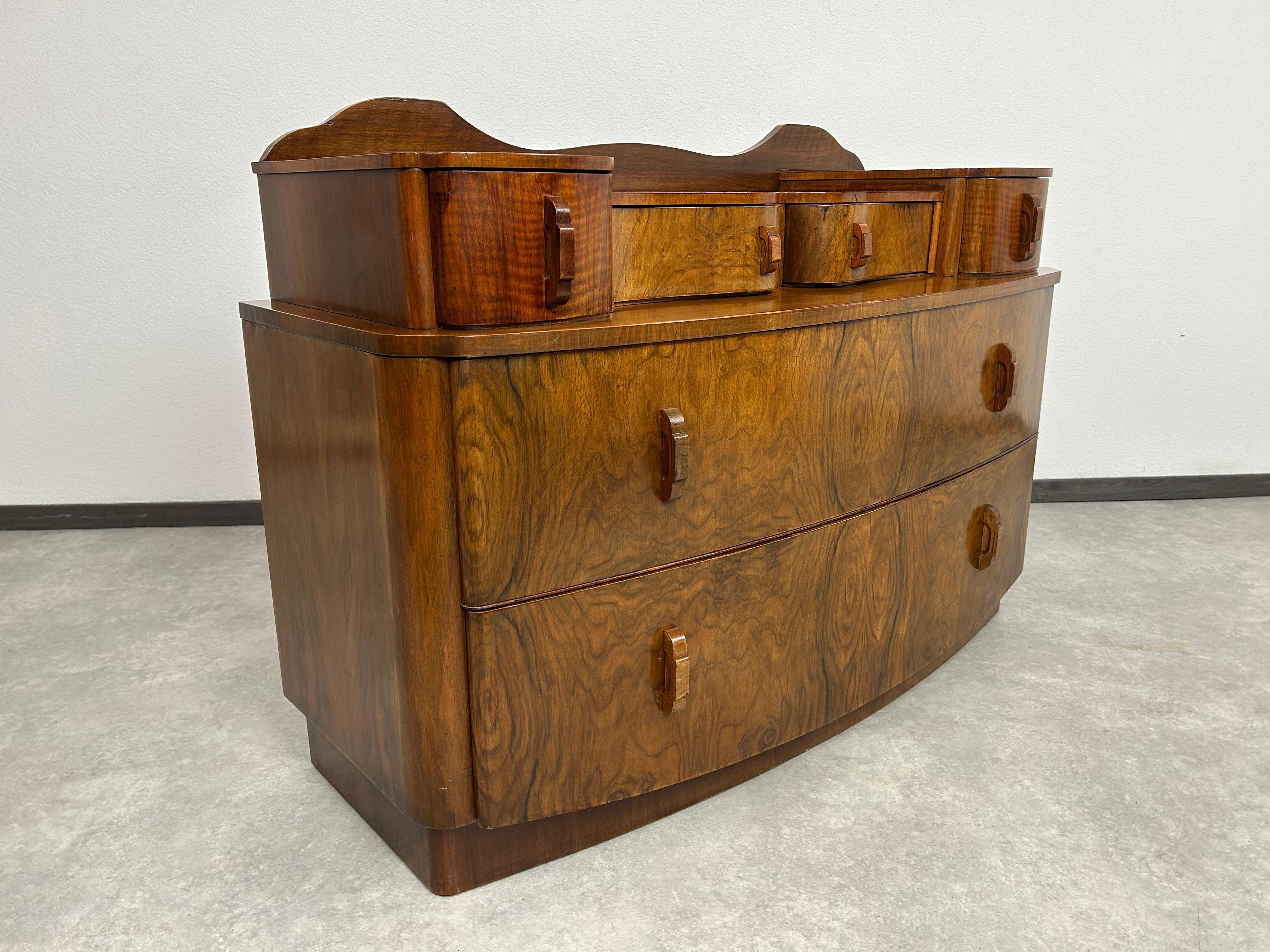 Art deco walnut cabinet in excellent original condition with signs of use.
