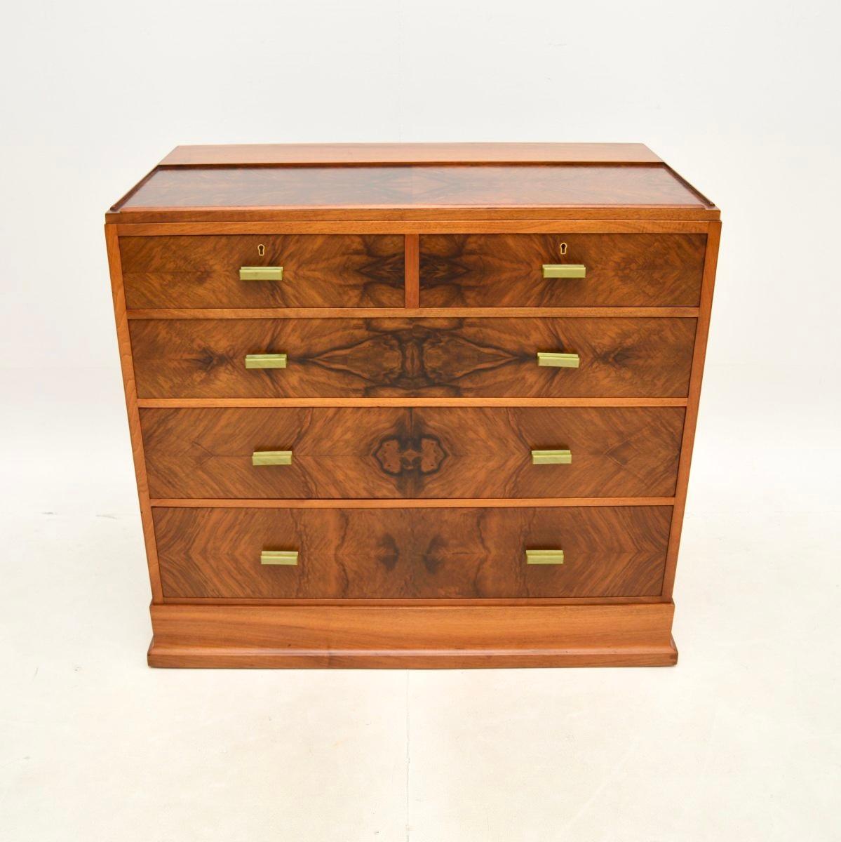 A superb Art Deco walnut chest of drawers by Hamptons of Pall Mall. This was made in England, it dates from the 1930’s.

Hampton’s of Pall Mall were known for furniture of exceptional quality, and this is no exception. It is beautifully crafted,