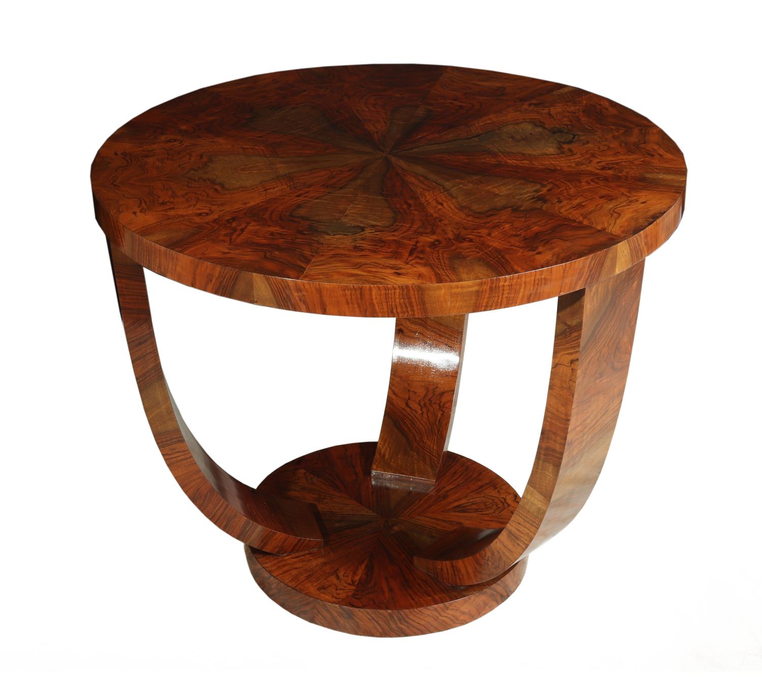 Art Deco walnut coffee table, circa 1930
This Art Deco walnut coffee table is from France in the 1930s. The coffee table has a u shaped base, segmented walnut top and has been fully restored and hand polished to be in excellent condition