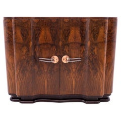 Art Deco walnut commode cabinet, Western Europe, mid-20th century.