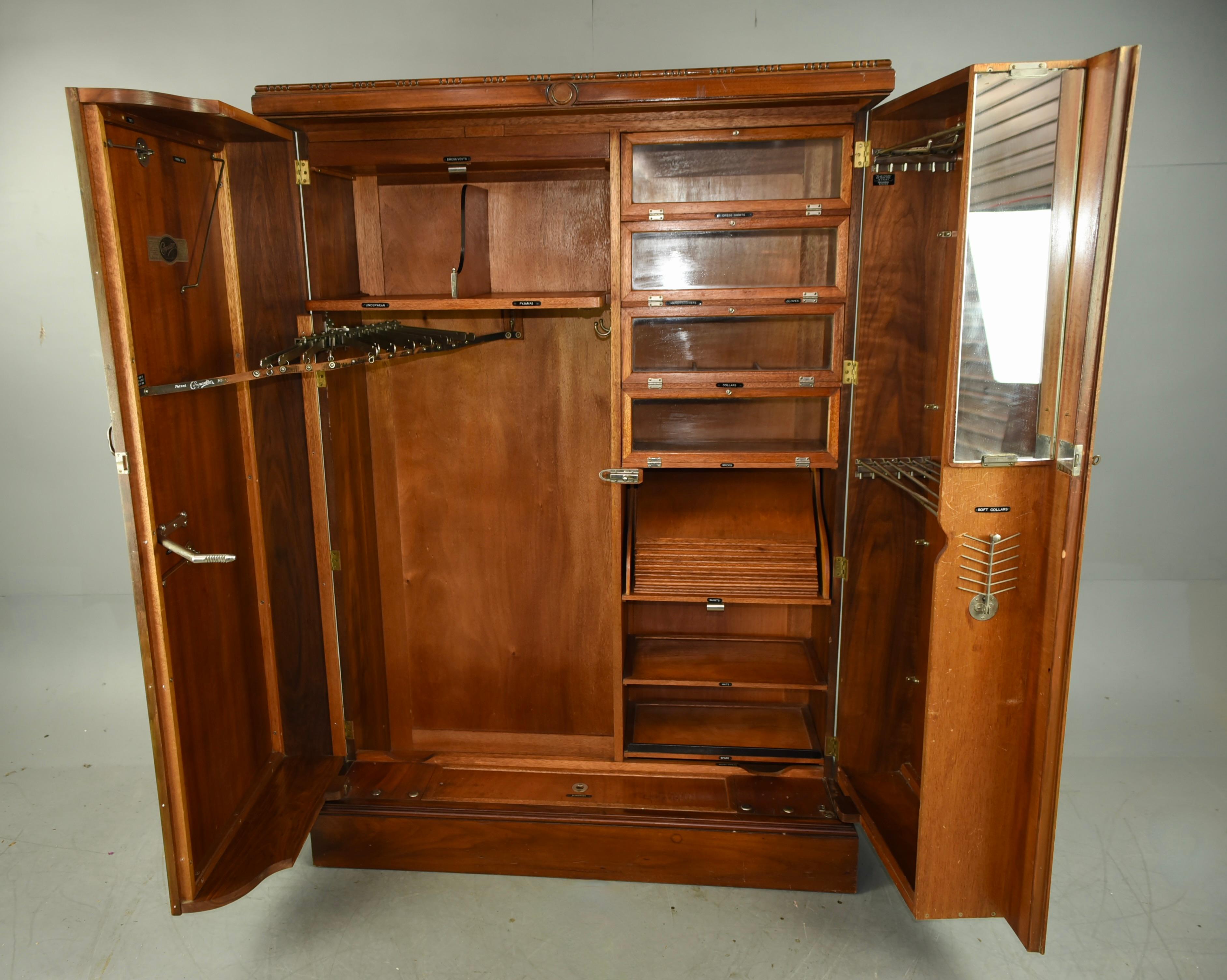 Original Art Deco walnut deep door compactum wardrobe circa 1920 .
In very good original condition , fully fitted interior with loads of storage .
It has a very well figured walnut front and a great colour . 
With original label on the back with