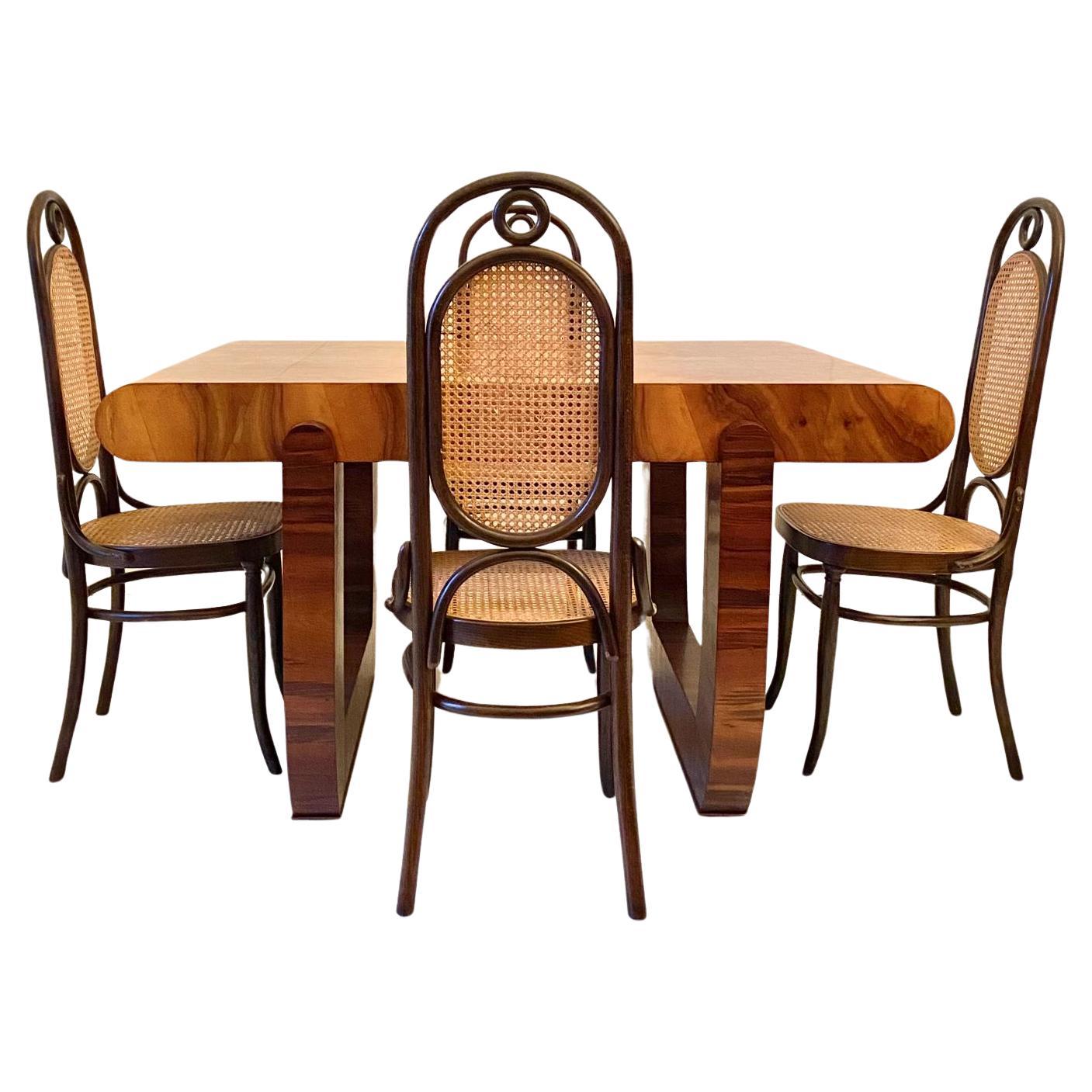 Art deco dining room set made by Art deco walnut table with refined briar root top and four Thonet chairs 
