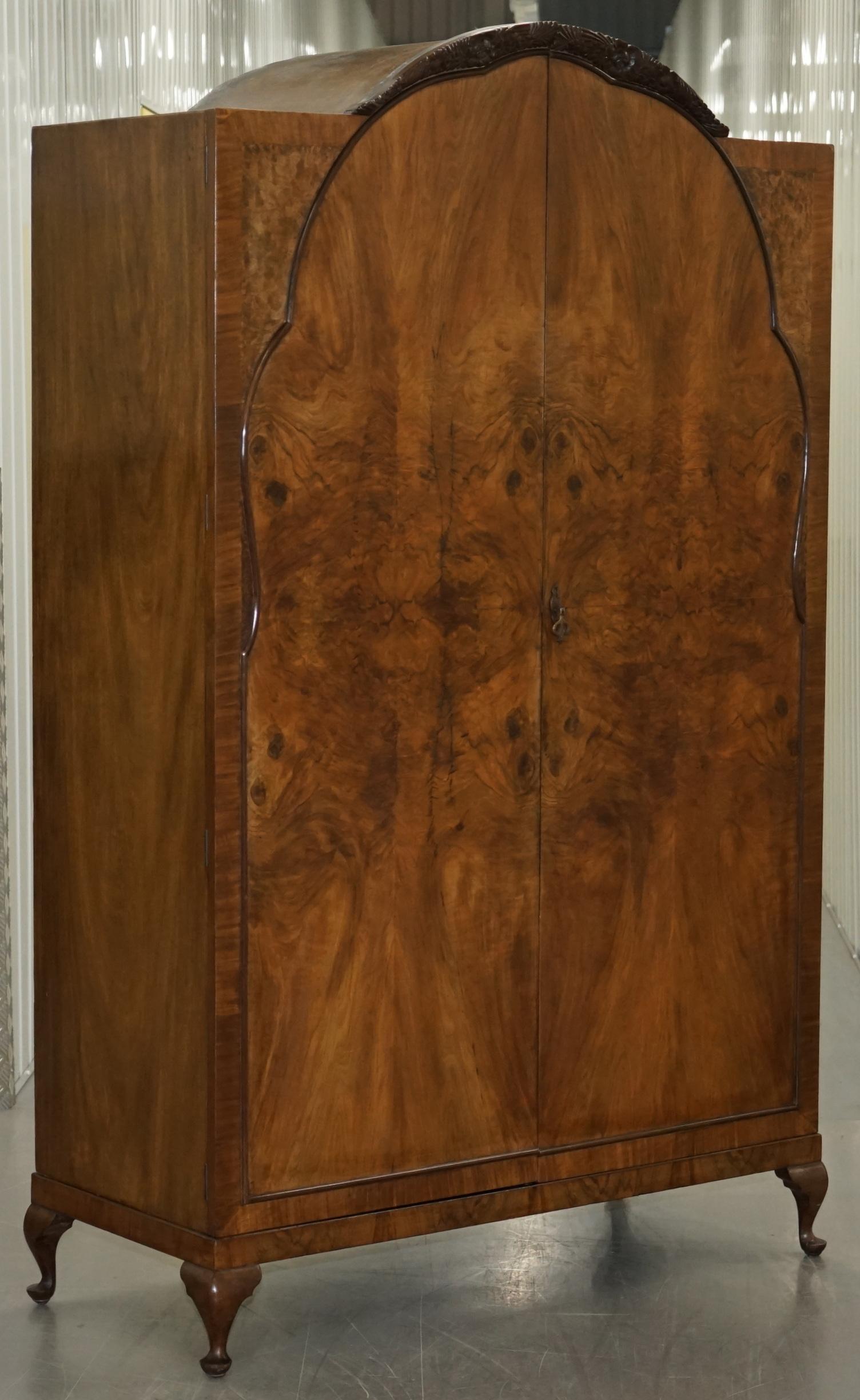 We are delighted to offer for sale this stunning original Art Deco quarter cut Walnut double wardrobe stamped Guaranteed hand made by British craftsman

This wardrobe is part of a suite, I have the matching chest of drawers and dressing table