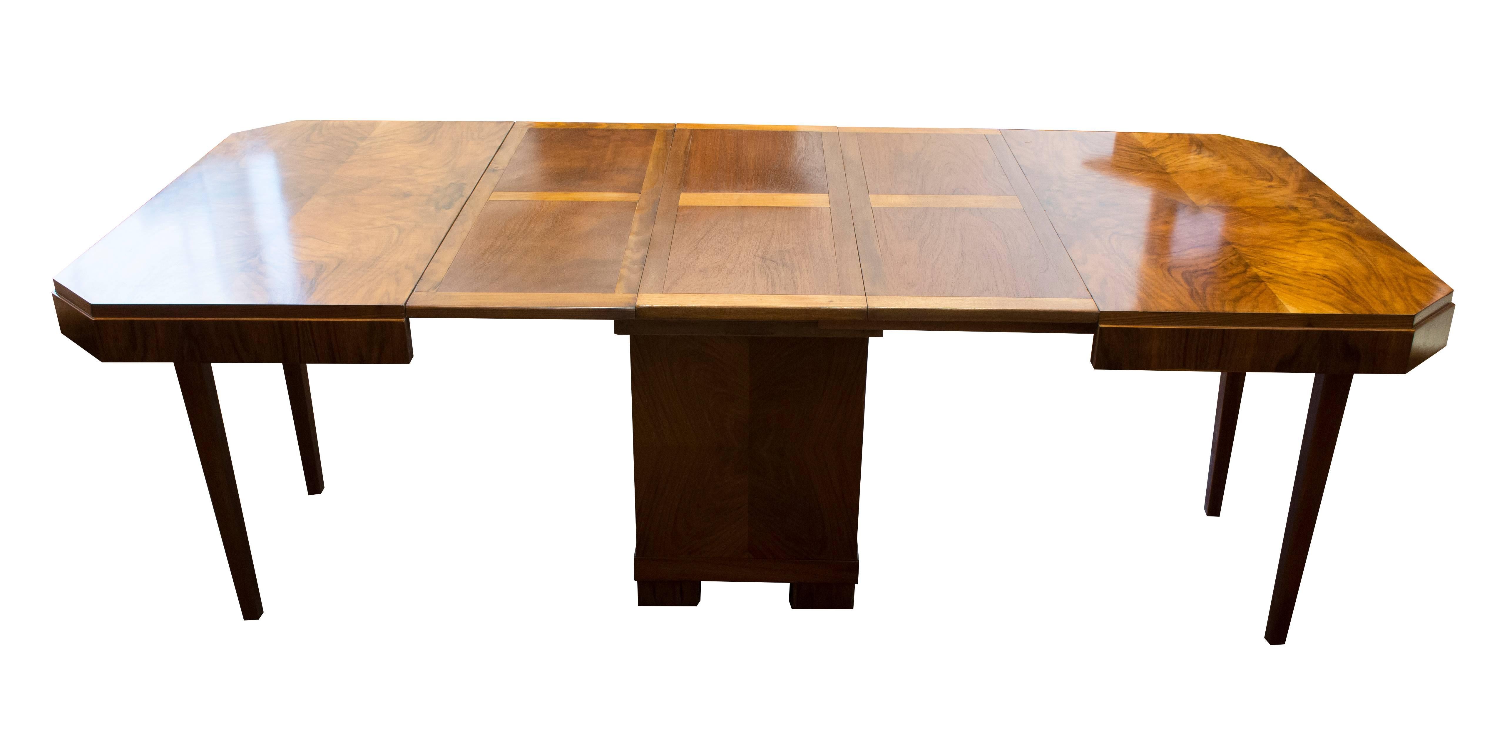 Very nice table from the Art Deco period, circa 1920. The table is made of walnut and can be extended. The table can be extended by 3 x 33cm (max 210cm). If the table is extended, additional support legs can be folded down on both sides.