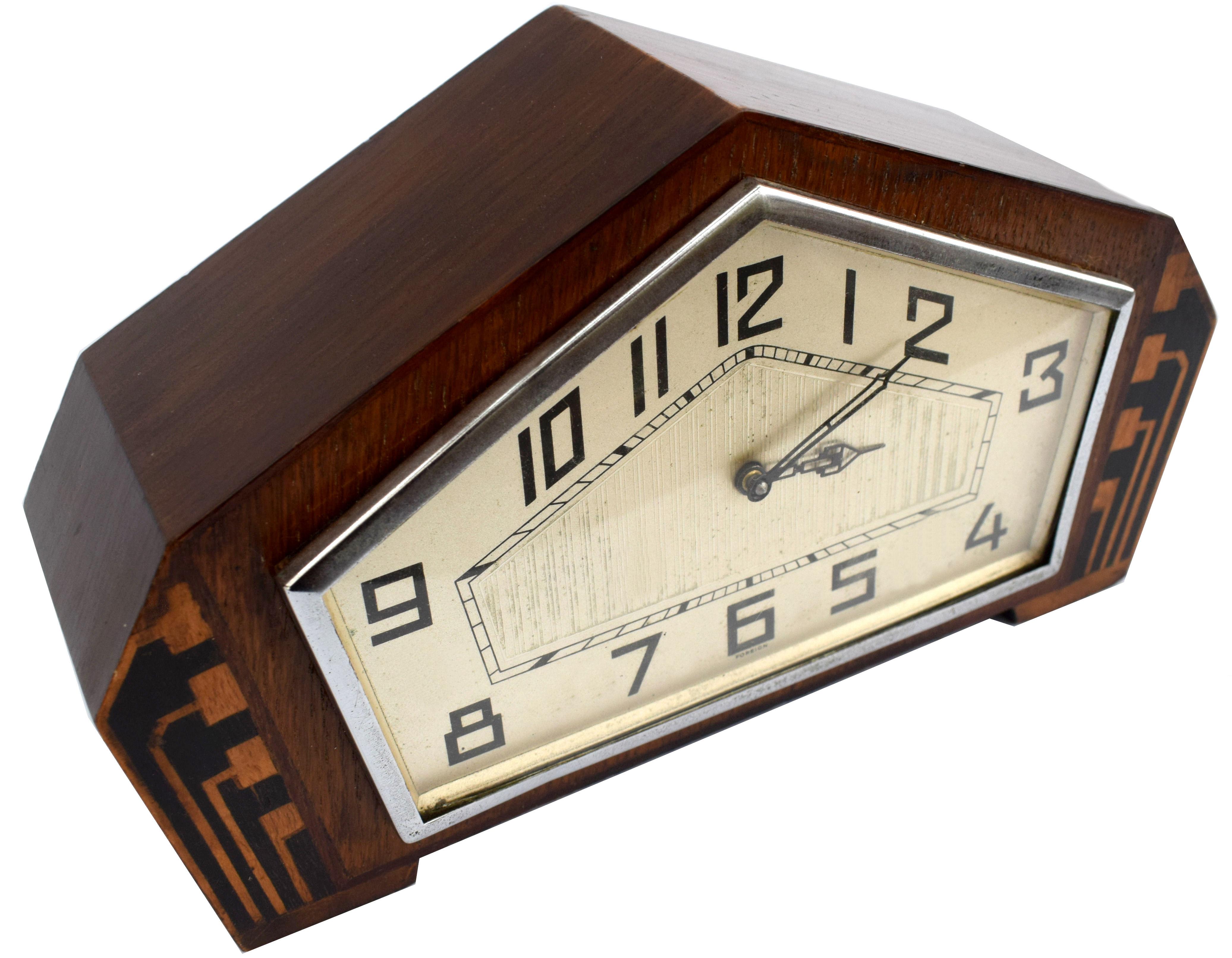 For your consideration is this very stylish Art Deco walnut mantle clock dating to the 1930's. Originating from England but marked to the dial foreign this clock can't be mistaken for any other era can it. The engine turned Champaign coloured dial