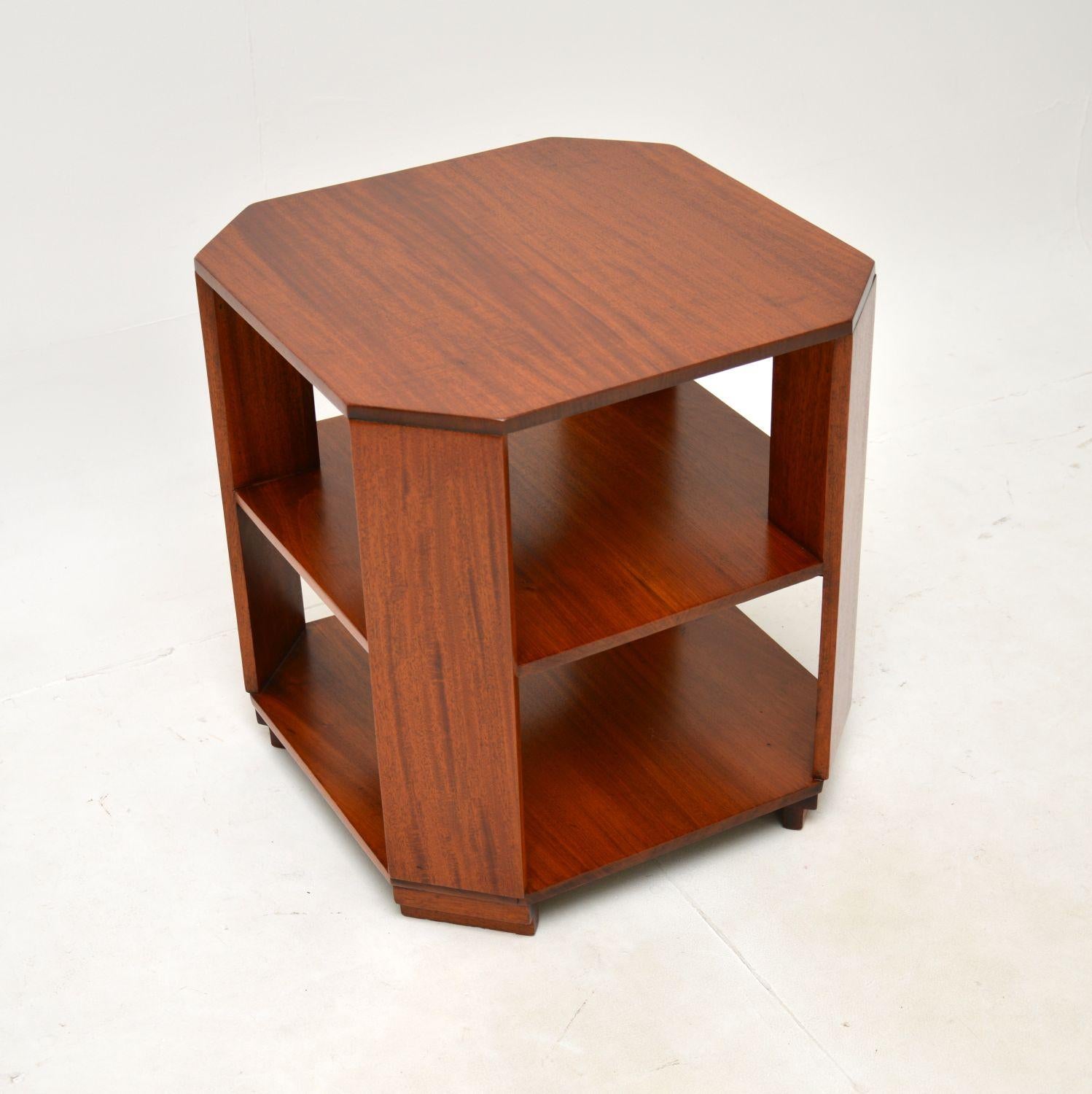 A lovely Art Deco walnut occasional coffee / side table. This was made in England, it dates from the 1920-30’s.

It is of superb quality, this is very well made and has a useful design. It is a handy size, with a very practical lower tier. The