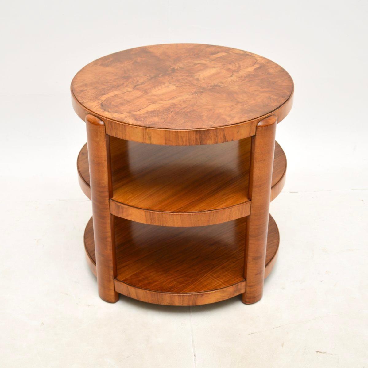 A stylish and extremely well made Art Deco walnut occasional side / coffee table. This was made in England, it dates from the 1920-30’s.

The quality is outstanding, this is beautifully crafted with a circular top, nicely moulded legs and an