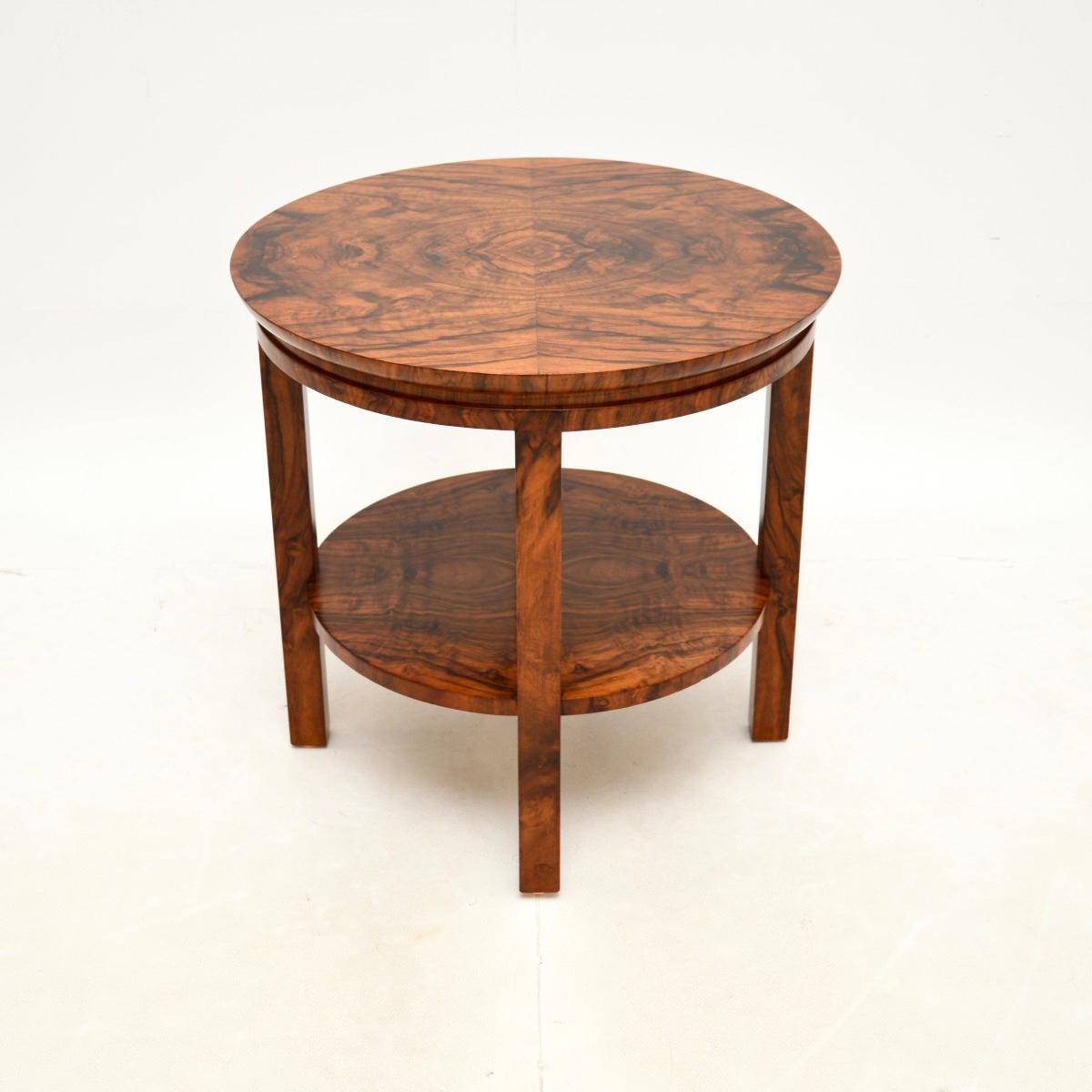 A stylish and extremely well made Art Deco walnut occasional side / coffee table. This was made in England, it dates from the 1920-30’s.

The quality is outstanding, this is beautifully crafted with a circular top, nicely moulded legs and an
