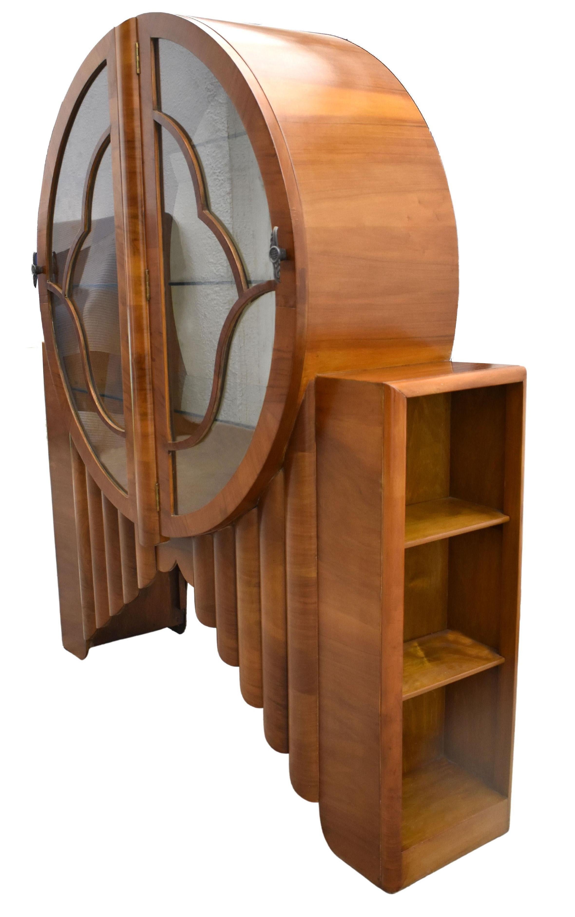 For your consideration is this fabulous and iconic Art Deco 'Rocket Cabinet' made in the 1930's and in veneered in a lovely mid tone walnut. Extremely hard to source and even harder to locate in decent condition, with gorgeous colouring. This