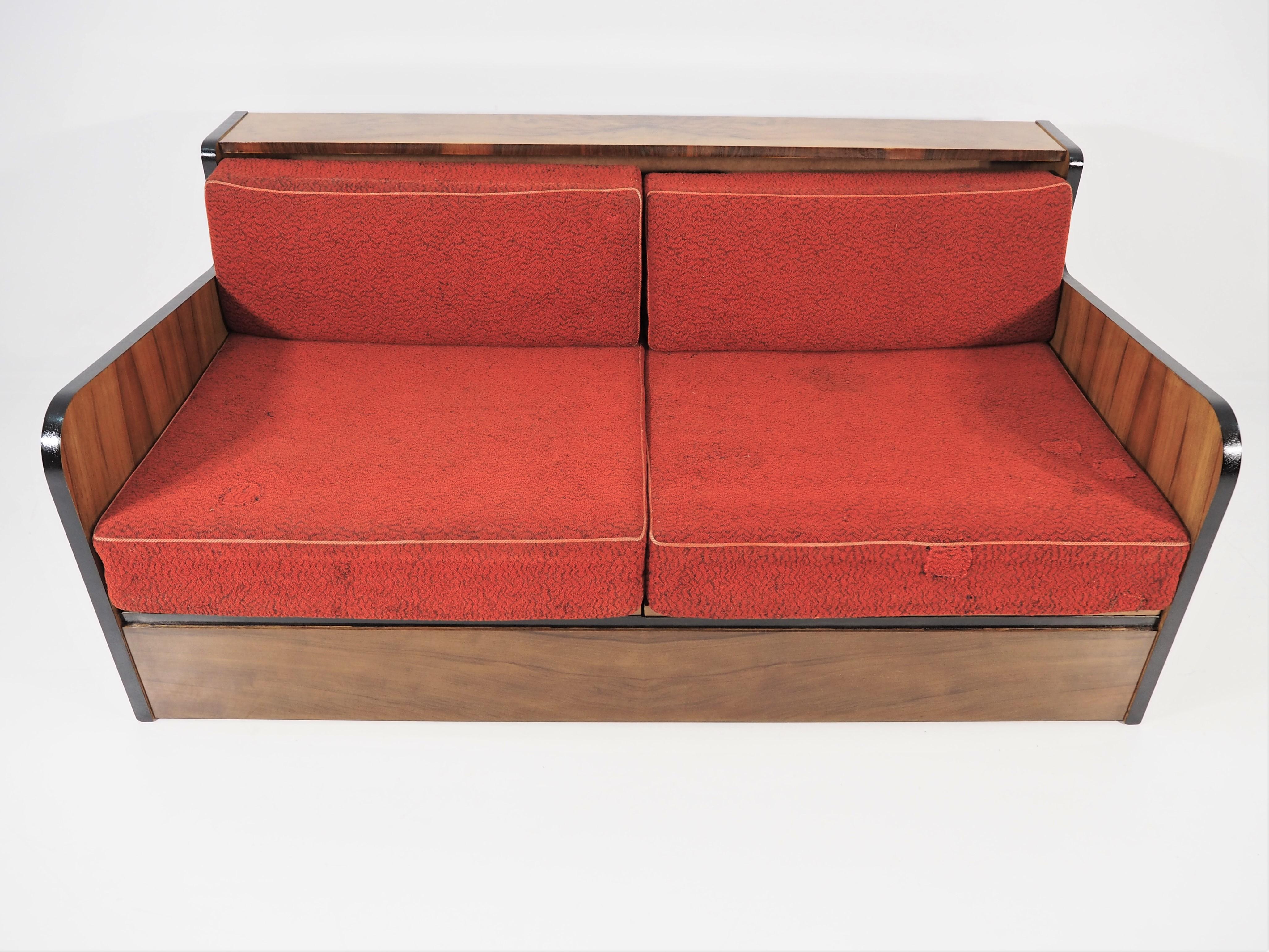 Czech sofa circa 1960 made in former Czechoslovakia. Dimensions: Height 80cm, length 176cm, width 110cm. Minimalist, walnut veneer.