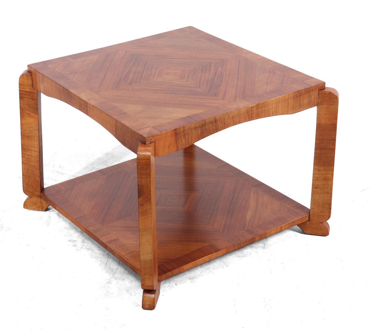 Art Deco walnut square coffee table, circa 1930
This Art Deco coffee table is a square two tier table that has been fully polished and is in good condition throughout it has quarter cut veneer with crossbanding on both levels

Age: 1930

Style: