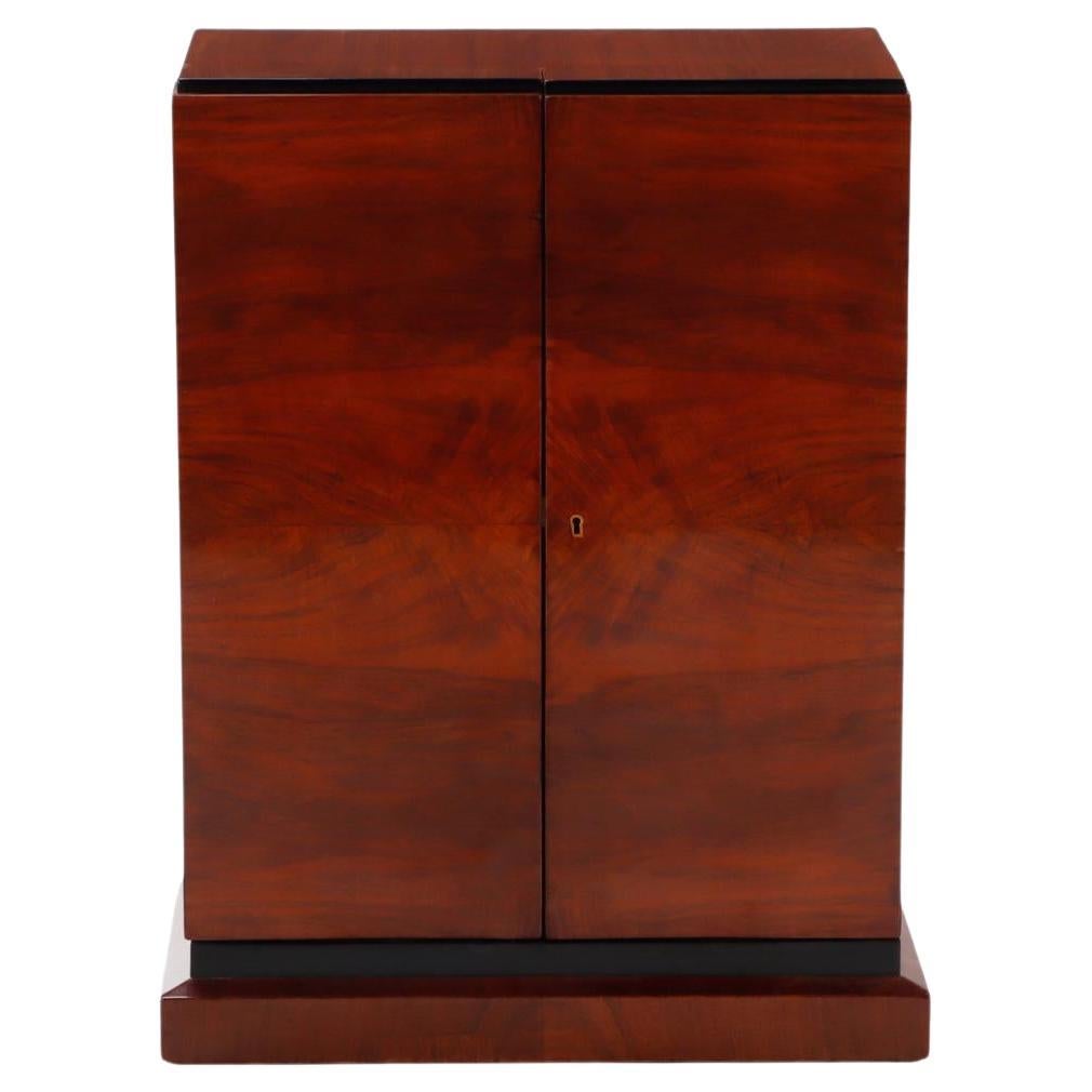 Art Deco walnut two door bar cabinet with ebonized details C 1940. For Sale