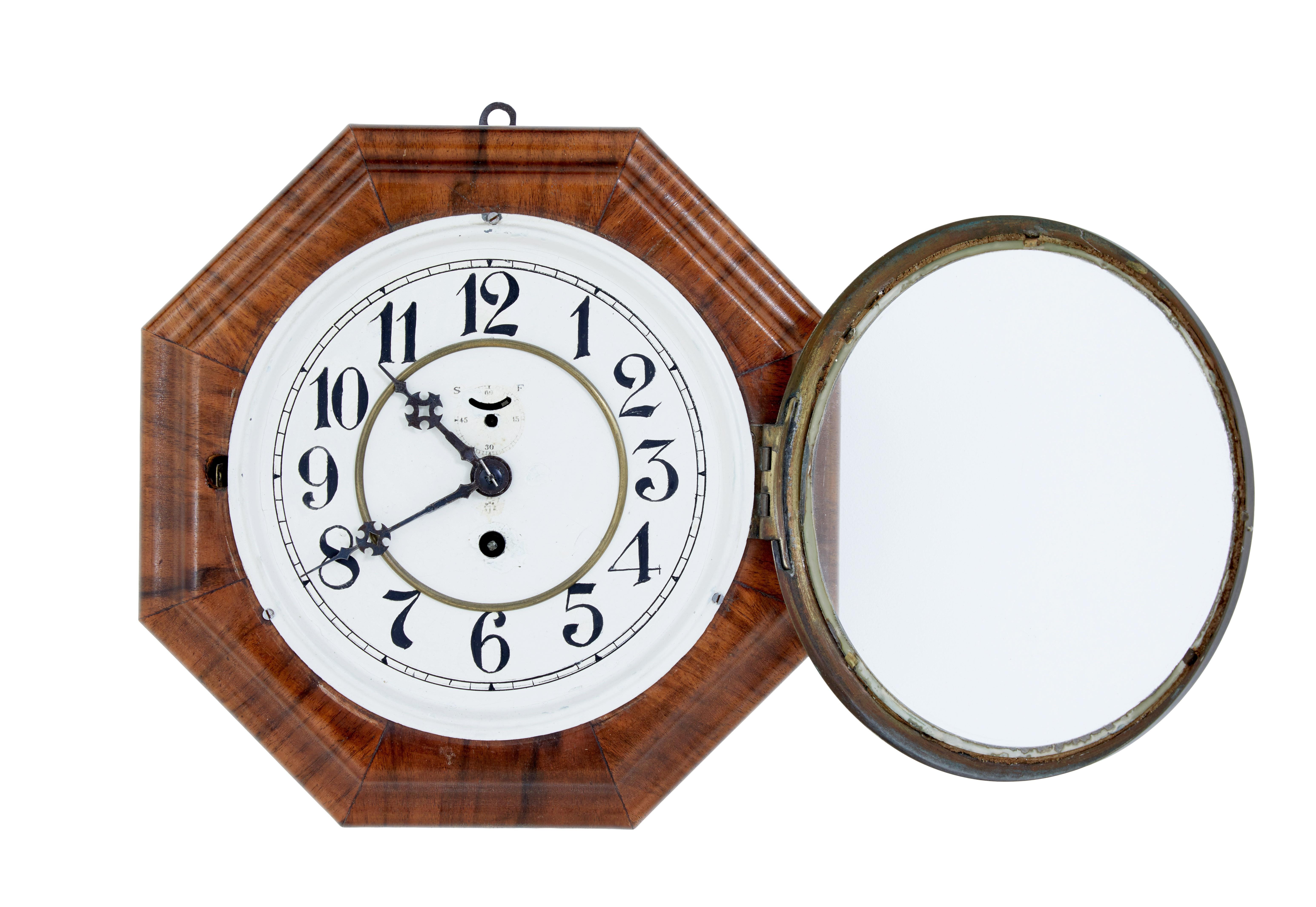 Art deco walnut wall clock by Junghans circa 1920.

Octagonal wall clock by well known clock makers Junghans. Starting from a small business in the mid 19th century to being one of biggest manufacturers of the early 20th century, and still going