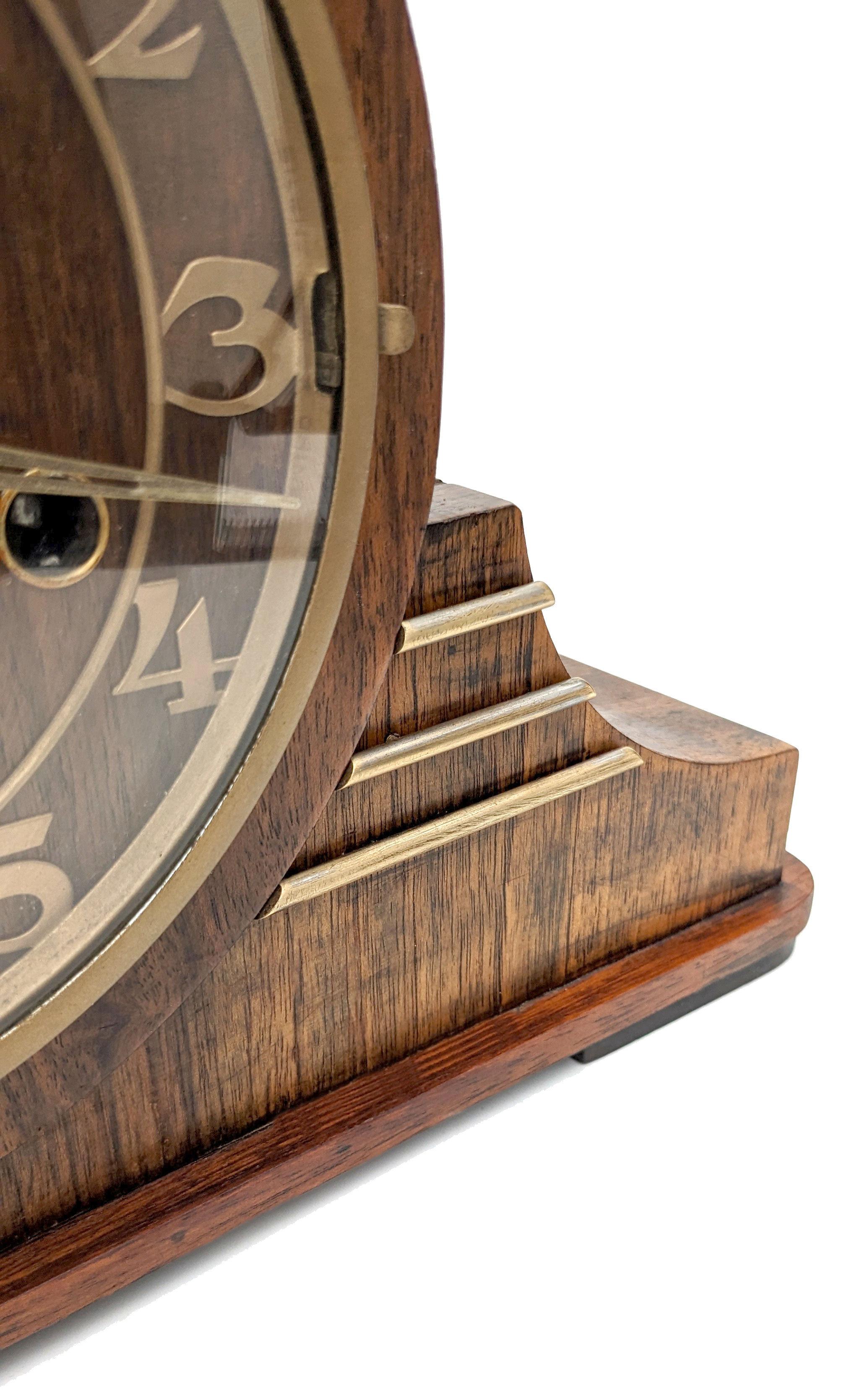 For your consideration is this very stylish 1930's Art Deco mantle clock made in Germany by clockmakers Haller . Full working order - serviced, tested and calibrated by a qualified horologist. Fabulous rare asymmetric case in straight grain walnut