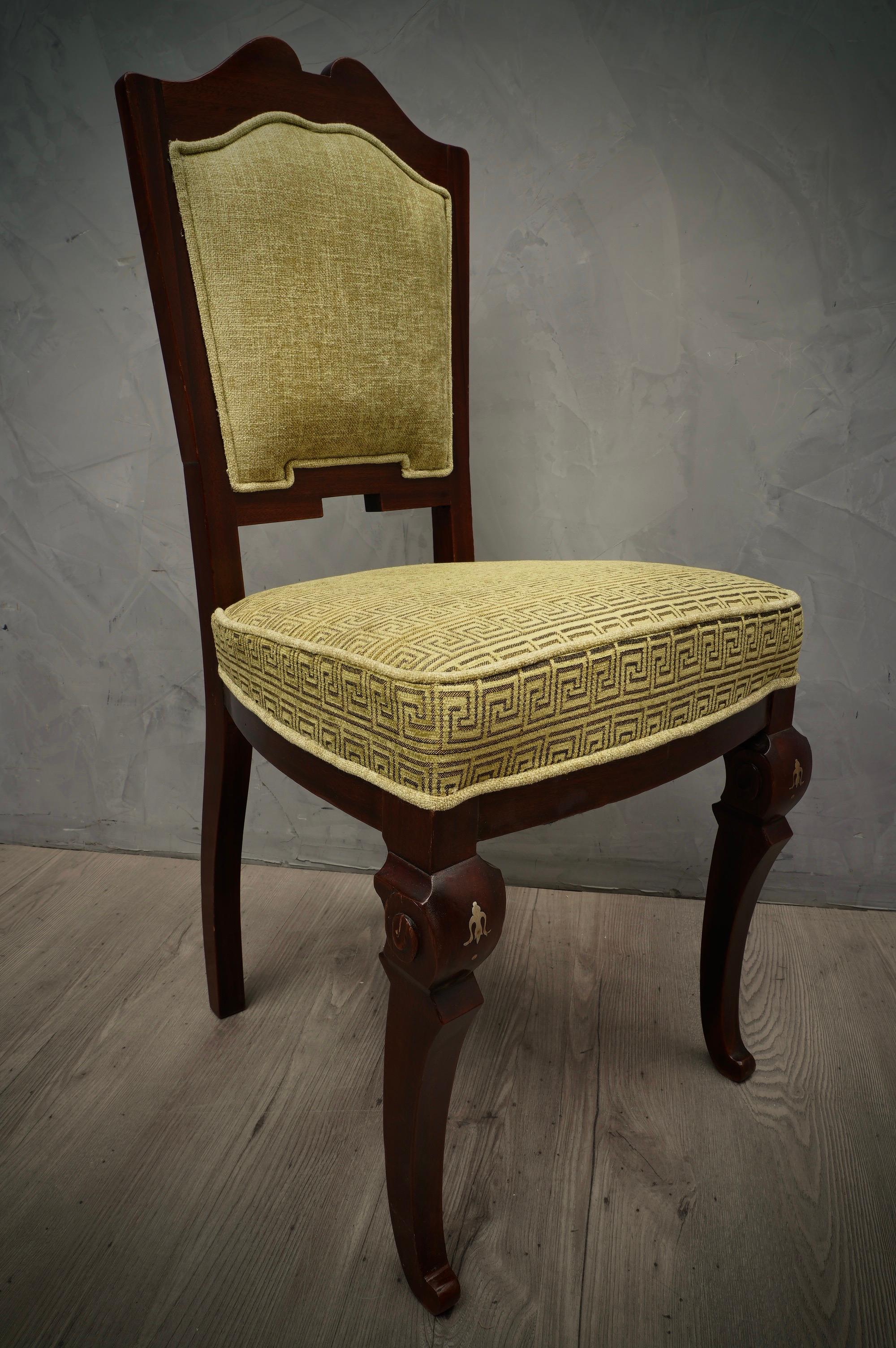 Elegant, sinuous and unique in their kind, this Exotic group of chairs of orientalist current, have been brought back in luster of their old splendor. Contrast of the walnut wood with the geometric upholstery green. 

The chairs are all in walnut