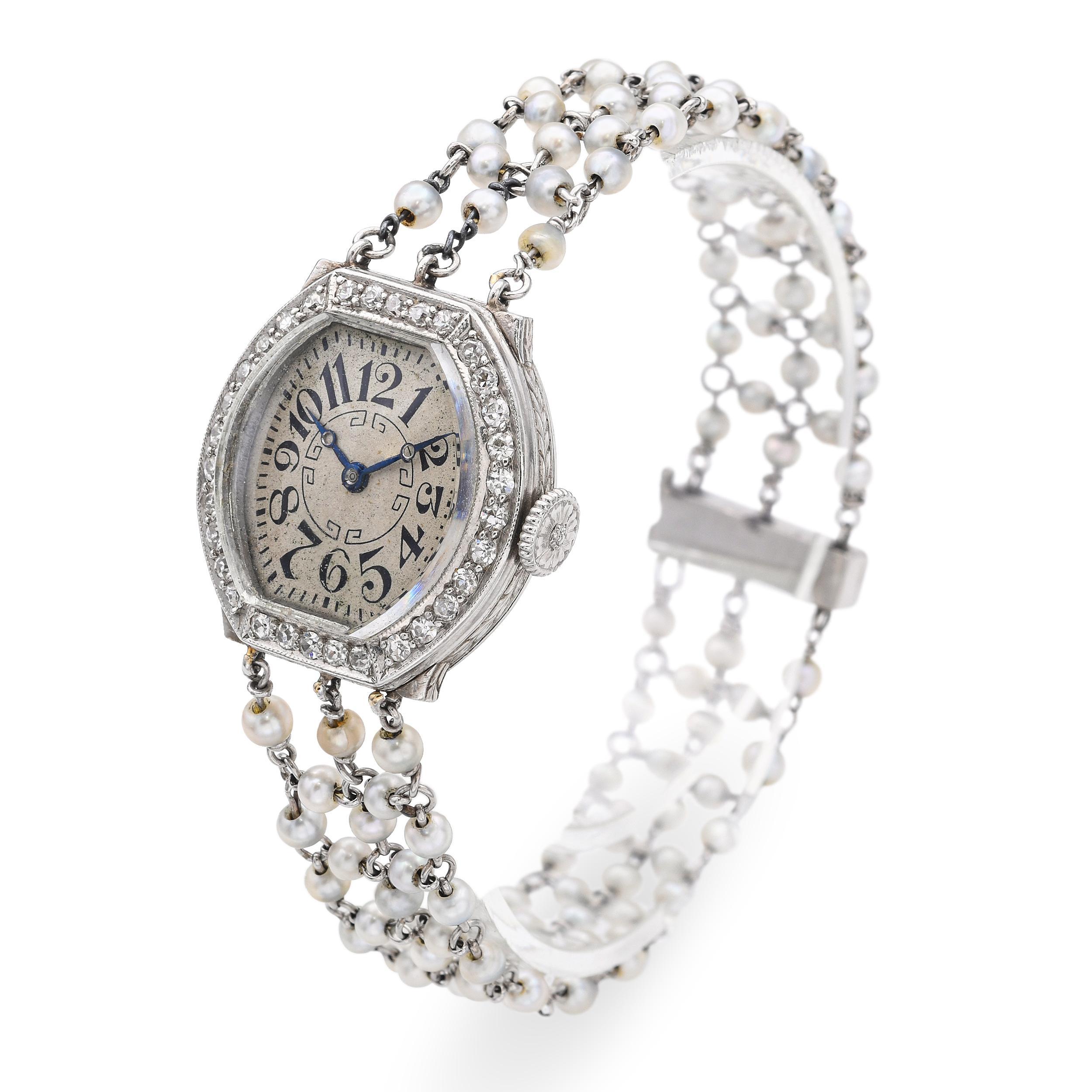This elegant Art Deco Waltham Ref. 3638 is crafted in platinum and adorned with natural pearls, showcasing refined early 20th-century design. The delicate case frames a classic dial, reflecting the timeless elegance of the era. Its slim silhouette