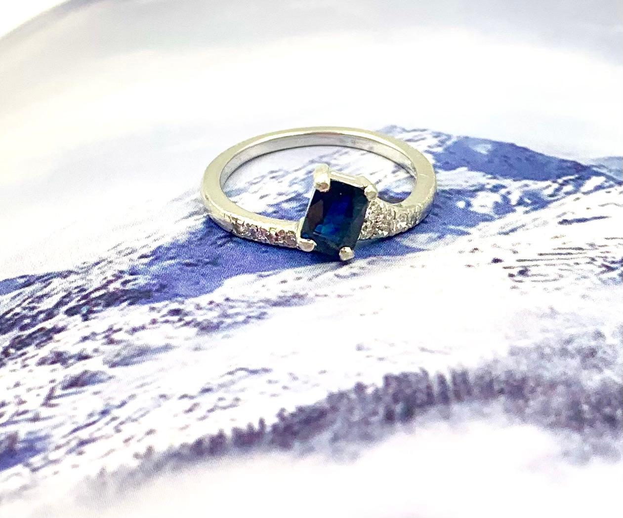 Fine Art Deco Wedderien natural sapphire, diamond and platinum Comet engagement ring 
Early 20th Century
Sapphire: Cushion, step cut, natural corundum with no indication of heating, .82 carat, deep blue, transparent, GIA report:
