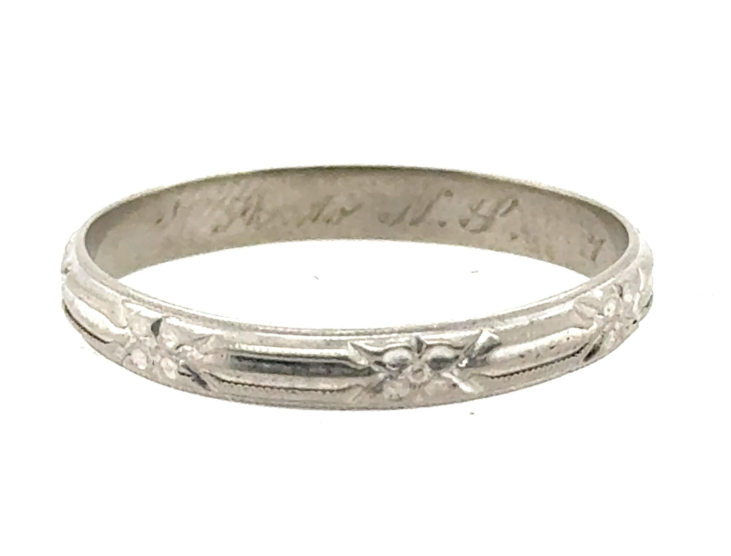 Genuine Original Antique Art Deco from 1935 Vintage White Gold Anniversary Wedding Ring Eternity Band



Features Hand Engraved Flowers Around Entire Piece 

Delicate Milgrain Edges

Hand Engraved Inside Shank 