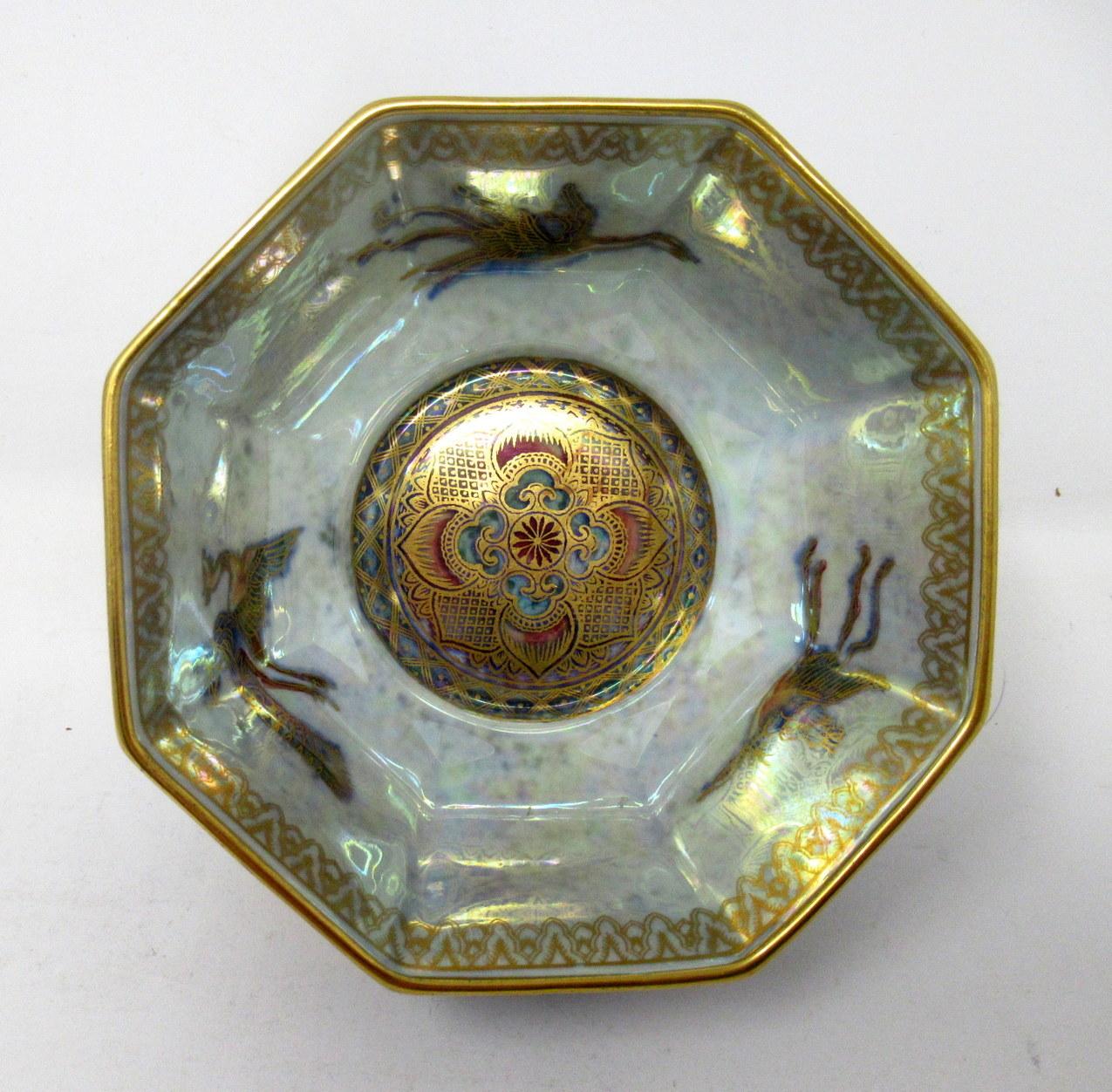 A very elegant Art Deco “Celestial Dragon” pattern Lustre SINGLE BOWL of compact proportions and octagonal form by Daisy Makeig-Jones, circa 1920-1930.

This finely made ceramic bowl is a derivative of her renowned “Fairyland Luster” series which