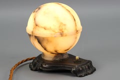 Art Deco White and Black Alabaster Globe Sphere Night Lamp or Mood Lamp, 1930s