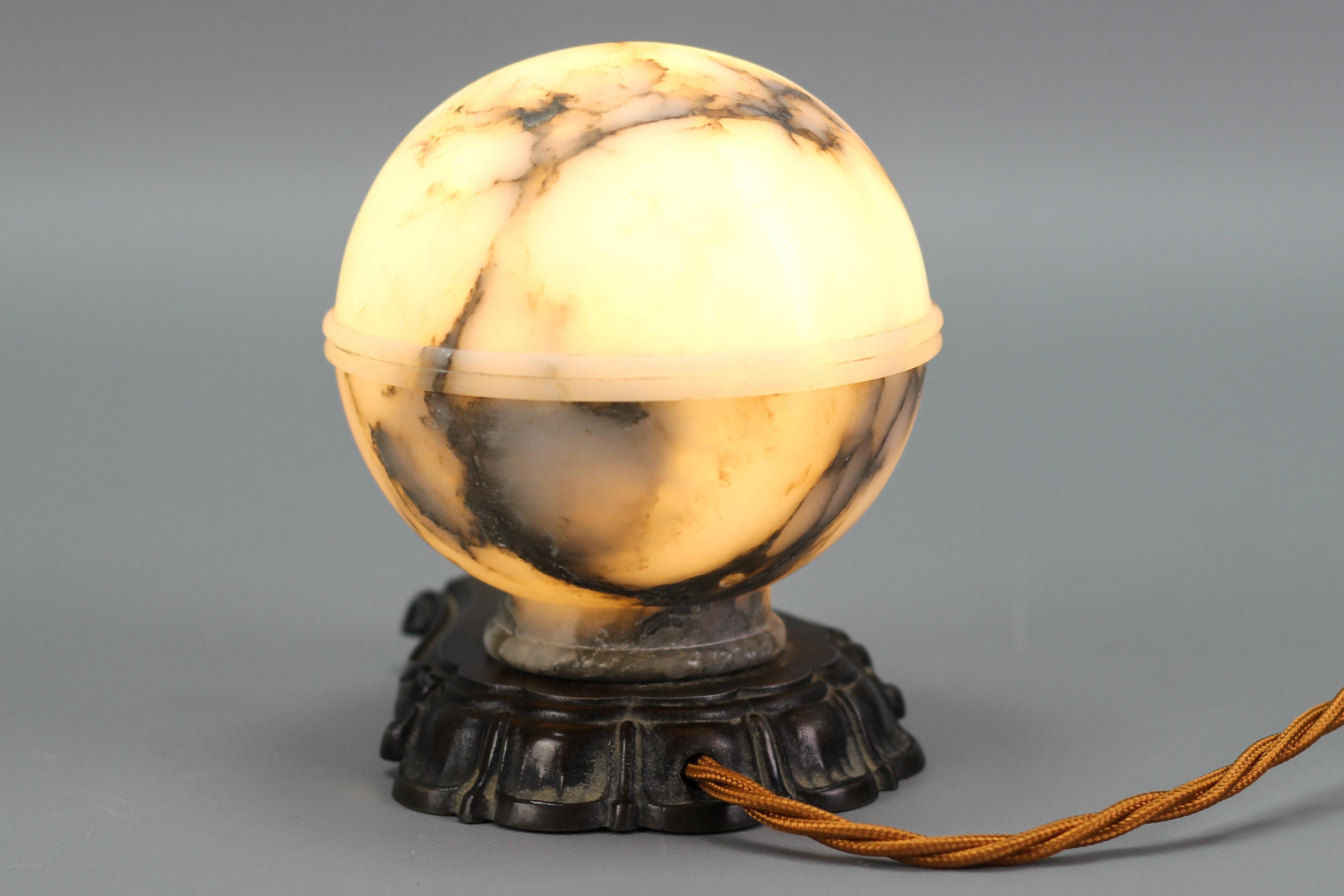 Mid-20th Century Art Deco White and Black Alabaster Globe Sphere Night Lamp or Mood Lamp, 1930s For Sale