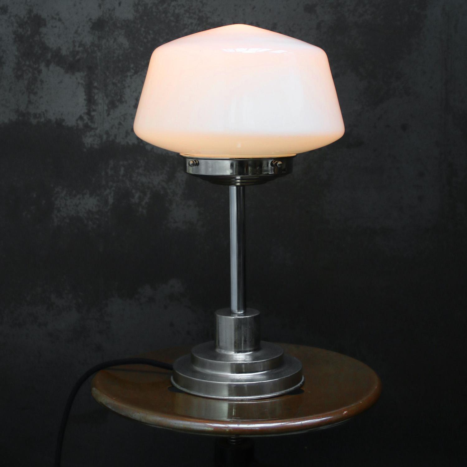 Art Deco Bauhaus Style Table or Desk Lamp with reeded opaline glass 

Diameter glass 25 cm / 9.8 inches
Diameter base 15 cm / 5.9 inches

Available with UK / US plug

Weight: 2.70 kg / 6 lb

Priced per individual item. All lamps have been made