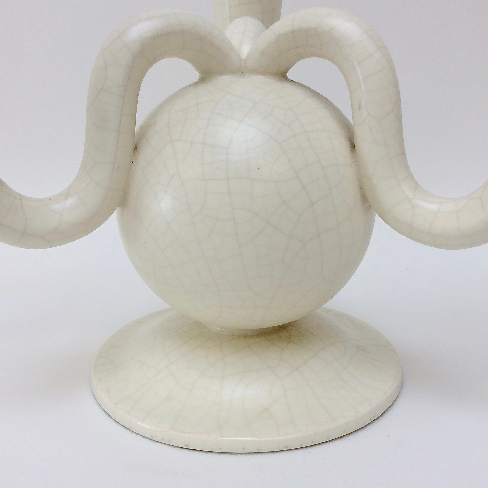 Nice Art Deco 3-arm candelabrum, circa 1930, France.
White crackled earthenware.
Dimensions: 21 cm height, 30 cm diameter.
Good condition.
All purchases are covered by our Buyer Protection Guarantee.
This item can be returned within 14 days of