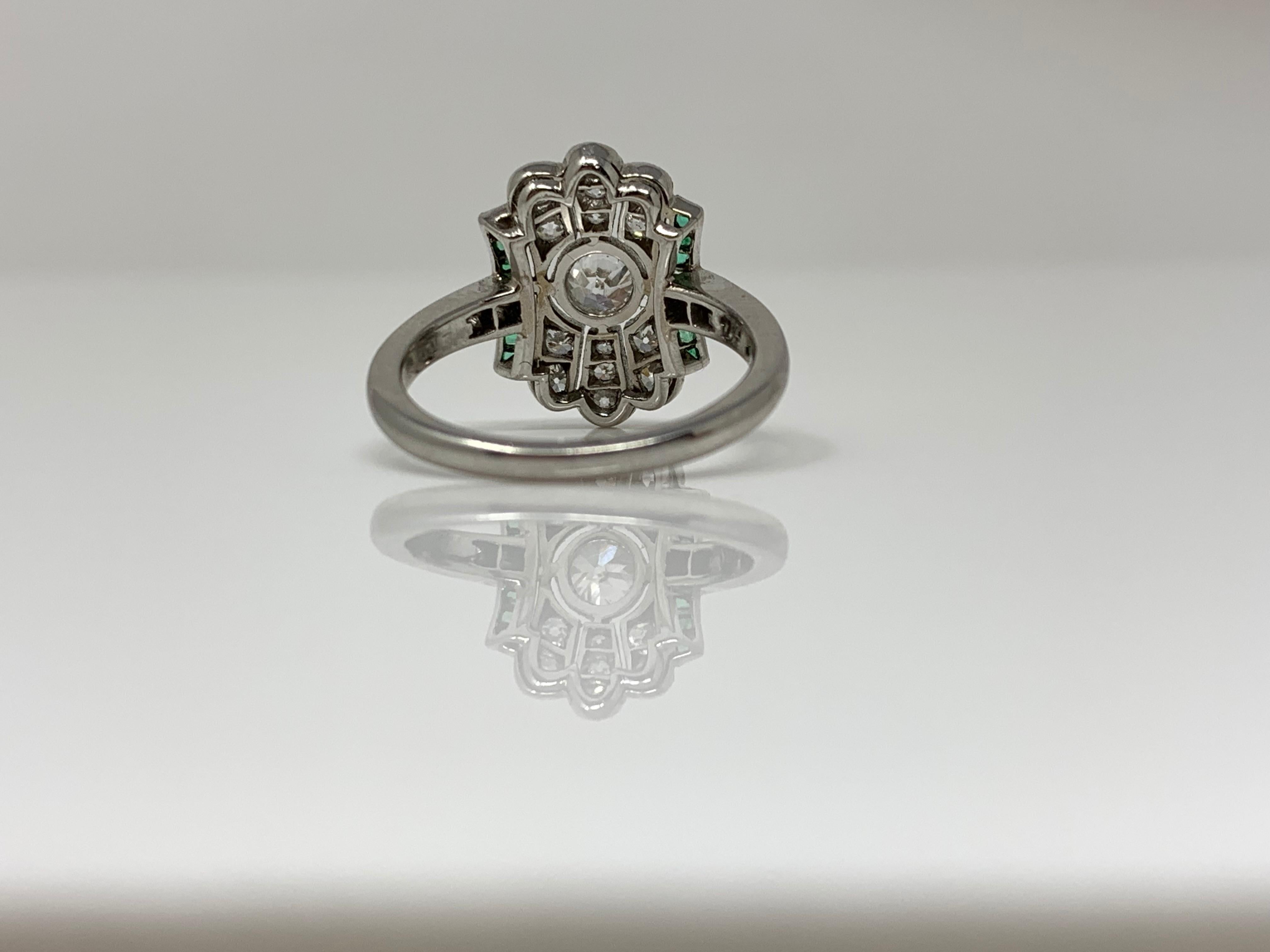 Old European Cut  White Diamond and Emerald  Ring in Platinum.
