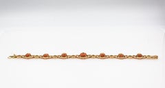 Gelbgoldarmband, Art déco, weißer Diamant, Smaragd, mediterrane rote Koralle, Gelbgold