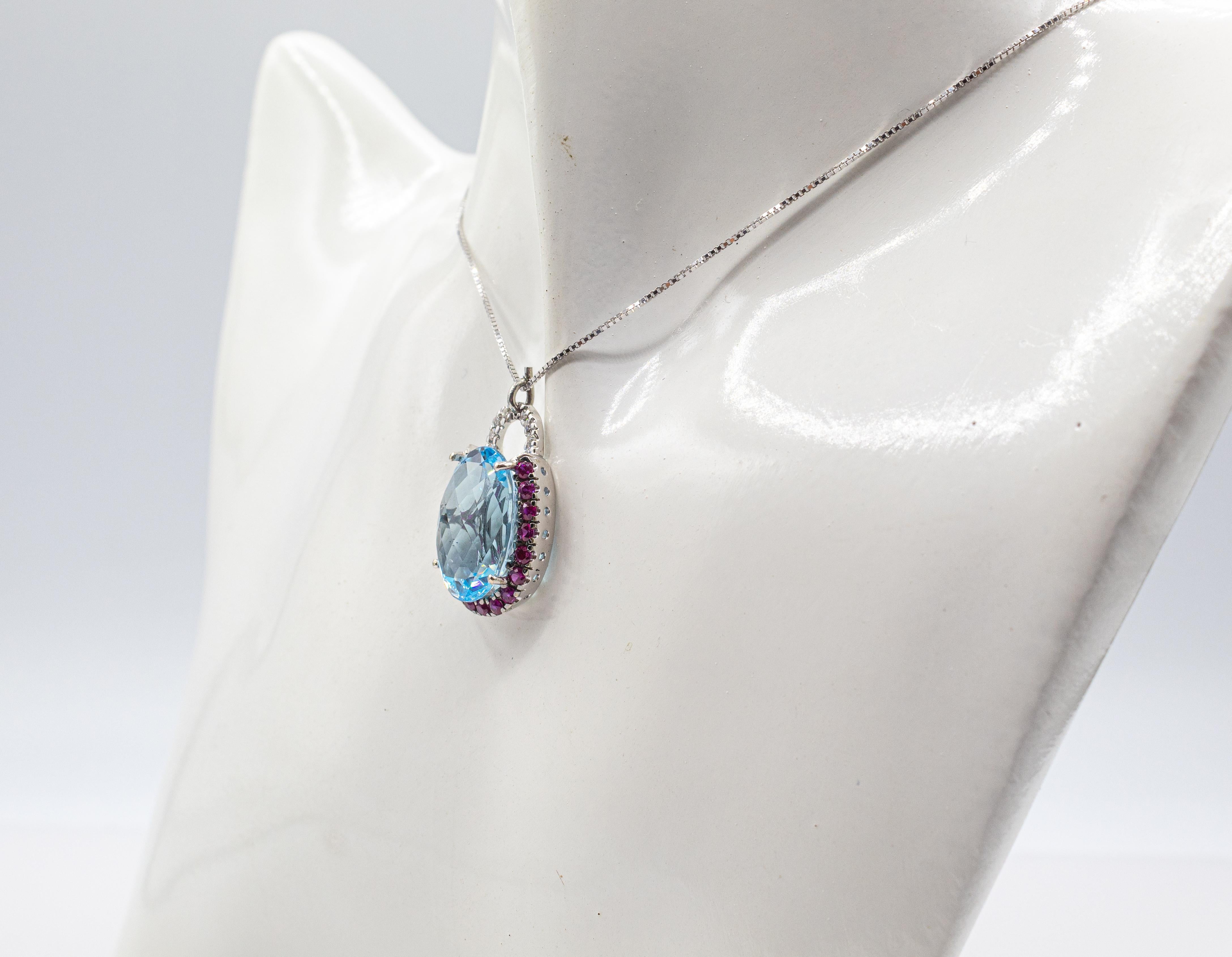Art Deco White Diamond Ruby Oval Cut Blue Topaz White Gold Pendant Necklace For Sale 1