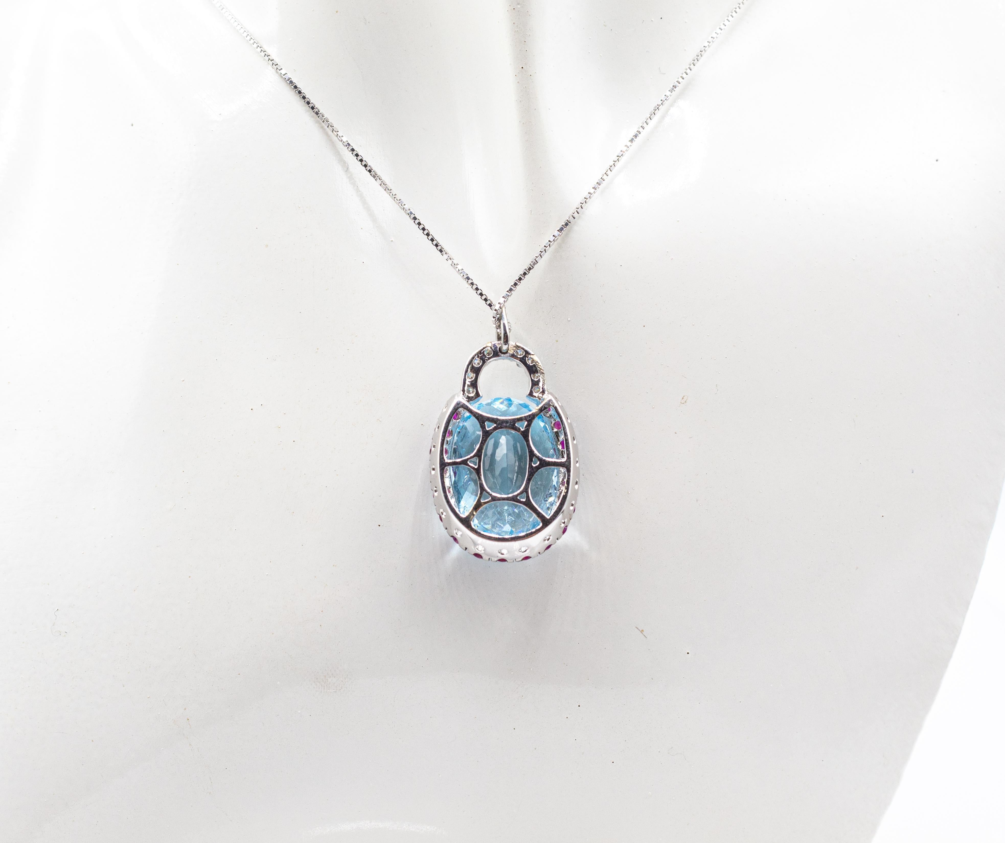 Art Deco White Diamond Ruby Oval Cut Blue Topaz White Gold Pendant Necklace For Sale 2