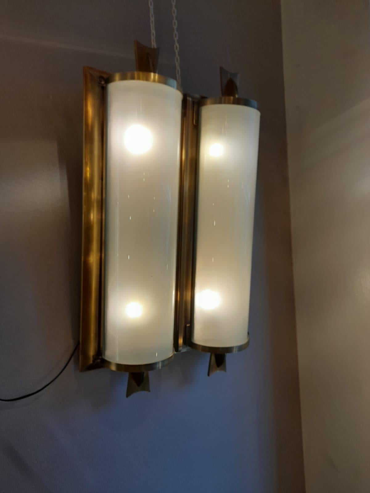 Mid-20th Century Art Deco White Glass and Brass Frame Wall Sconce