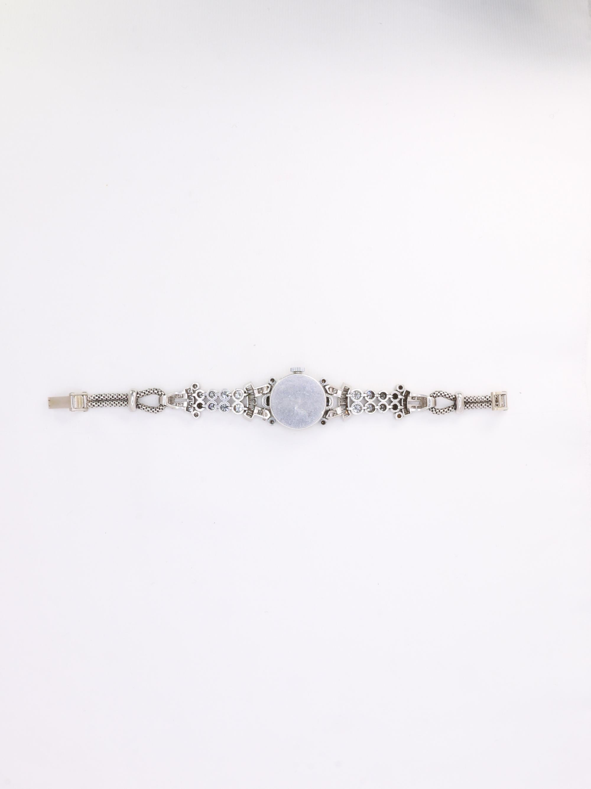 Taille brillant Montre Art déco en or blanc, platine et diamants en vente