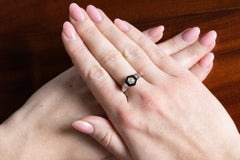 Art Deco white gold ring with a 0.30ct old-cut diamond and onyx, 1944.