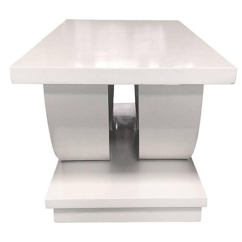 Table basse originale Streamline Art Deco conçue par Gilbert Rohde pour la société de meubles Brown Saltman. La table présente un design frappant à double arche, mélangeant des arcs arrondis avec un plateau et une base à lattes. Son design à deux