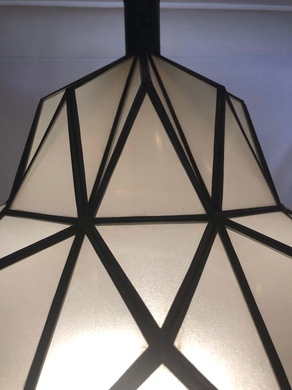 A stunning Art Deco style dome form milk glass white chandelier or lantern. Having individual panes, possessing an open door pane leading to a double recently wired setting housing one sixty watts bulbs. These fine custom lantern are sure to light