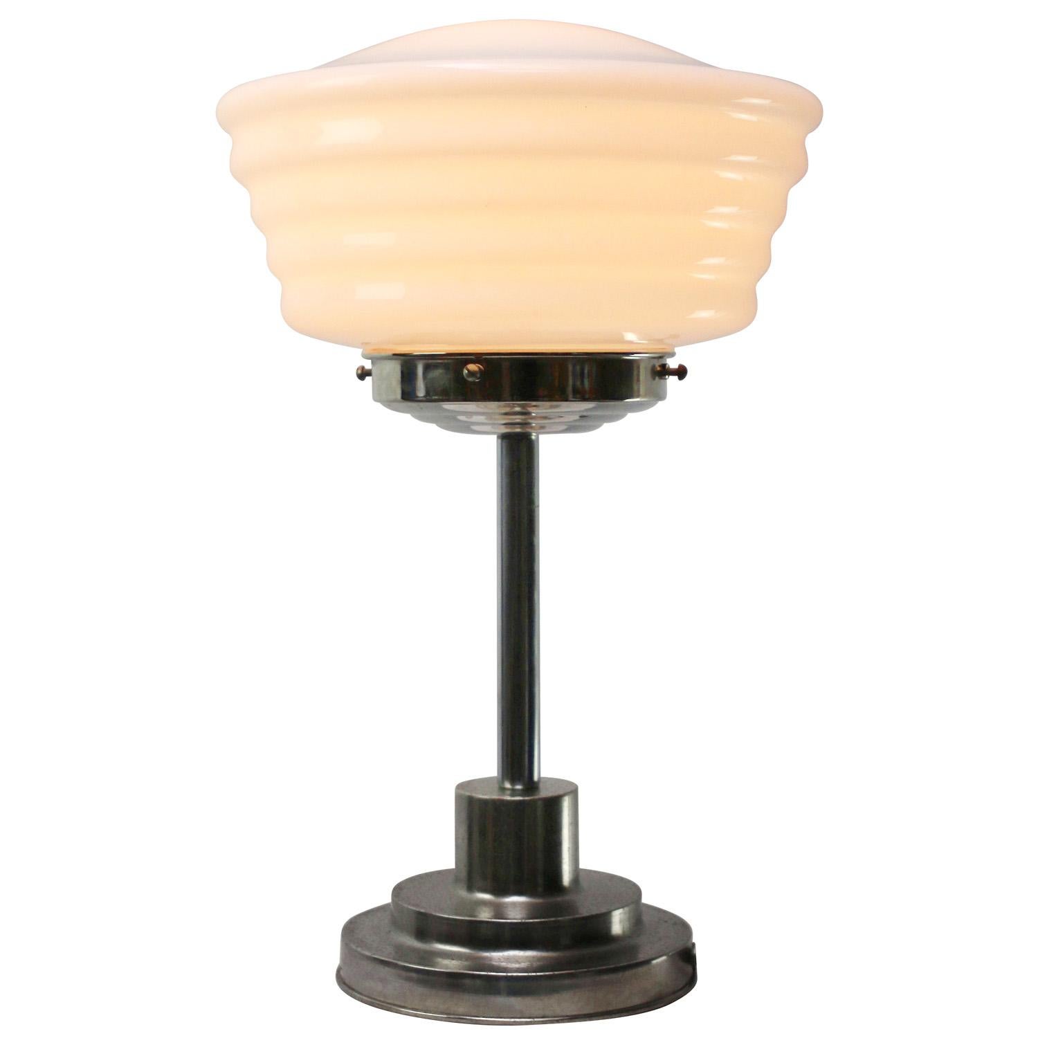 Art Deco Bauhaus Style Table or Desk Lamp with reeded opaline glass 

Diameter glass 26 cm  / 10.2 inches
Diameter base 15 cm  / 5.9 inches

Available with UK / US plug

Weight: 2.70 kg / 6 lb

Priced per individual item. All lamps have been made