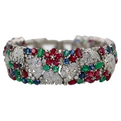 Art Deco Wide Diamond Bracelet Sapphires, Rubies, Emeralds, Diamonds Platinum