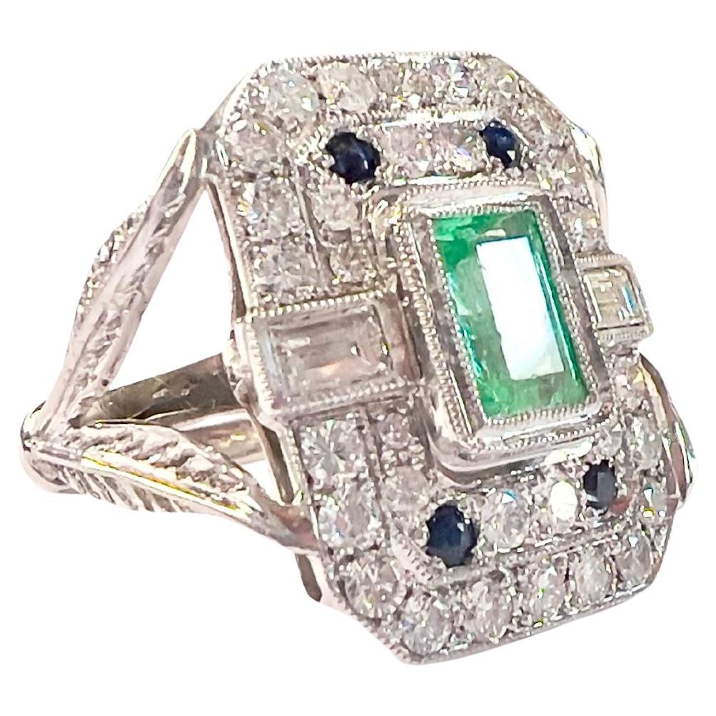 Art Deco with Diamonds, Sapphires, and Emerald Platinum Ring