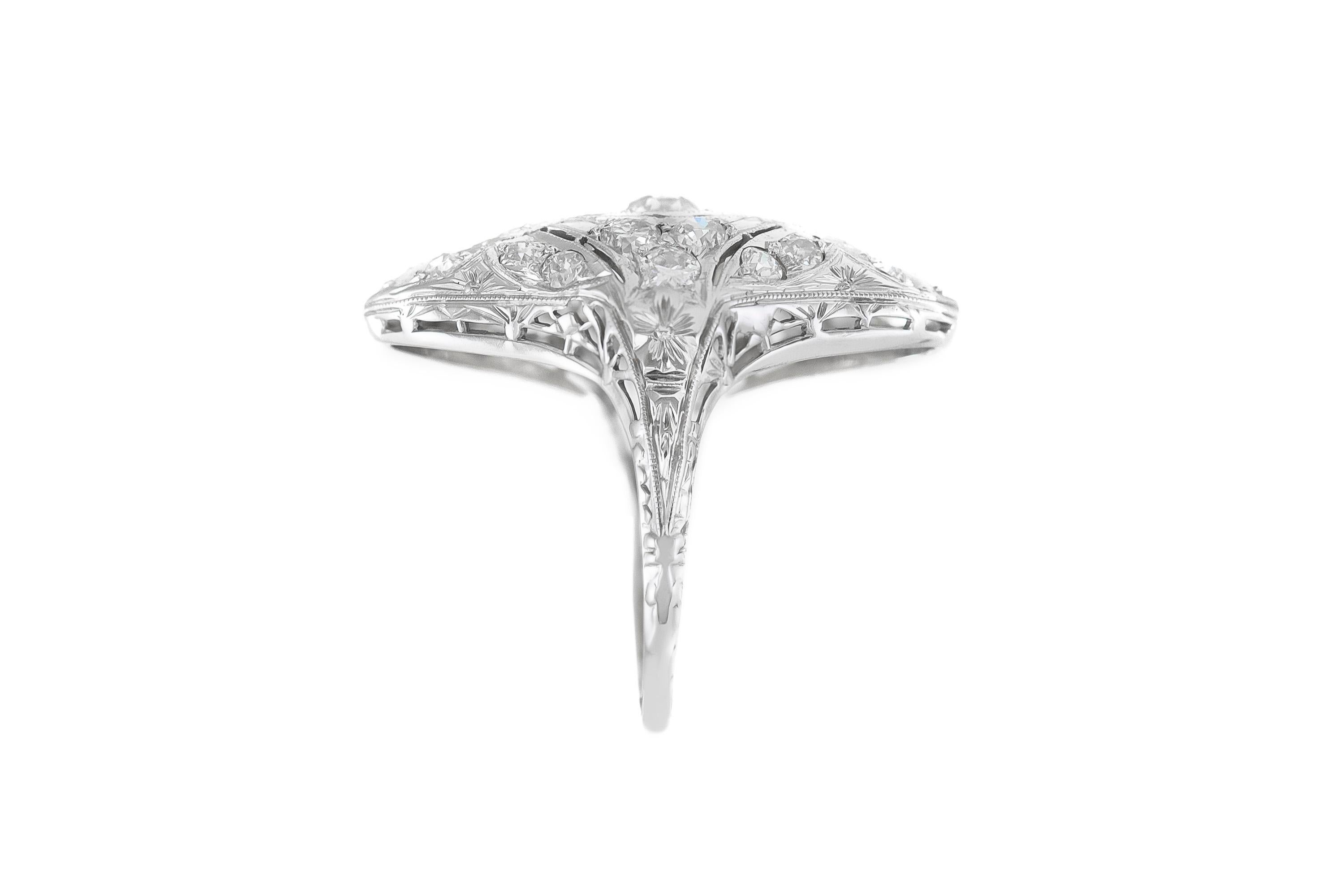 The ring is finely crafted in 18k white gold with diamonds weighing approximately total of 2.20 carat.
Size 6.00 ( easy to resize)
Circa 1930