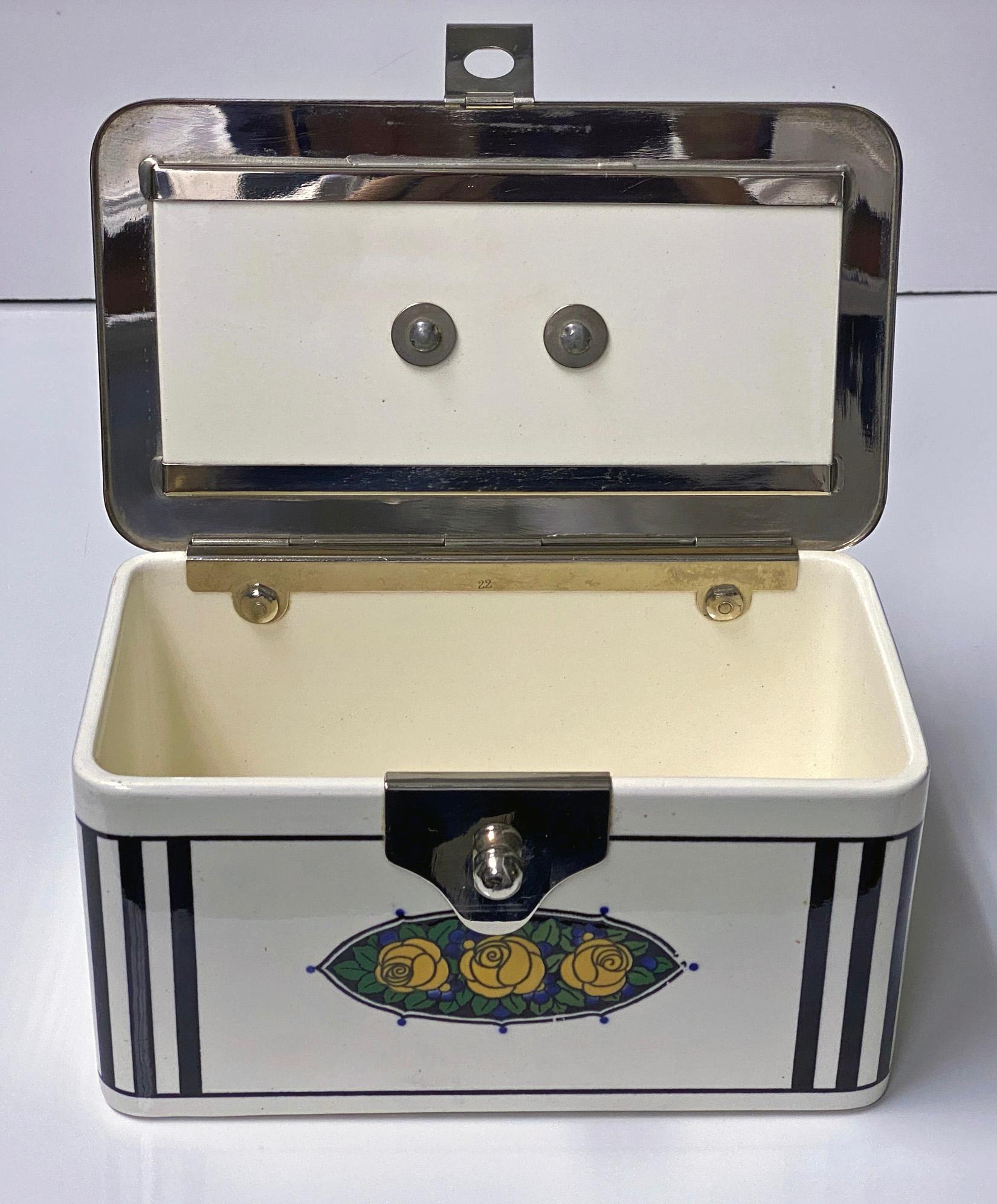 Art Deco WMF and Wachtersbach ceramic Jugendstil Arts & Crafts rose pattern lunch sandwich hasp lock box. Designed by Christian Neureuther & Joseph Olbrich, circa 1910. The box with wonderful yellow, green and deep violet cartouche design surround