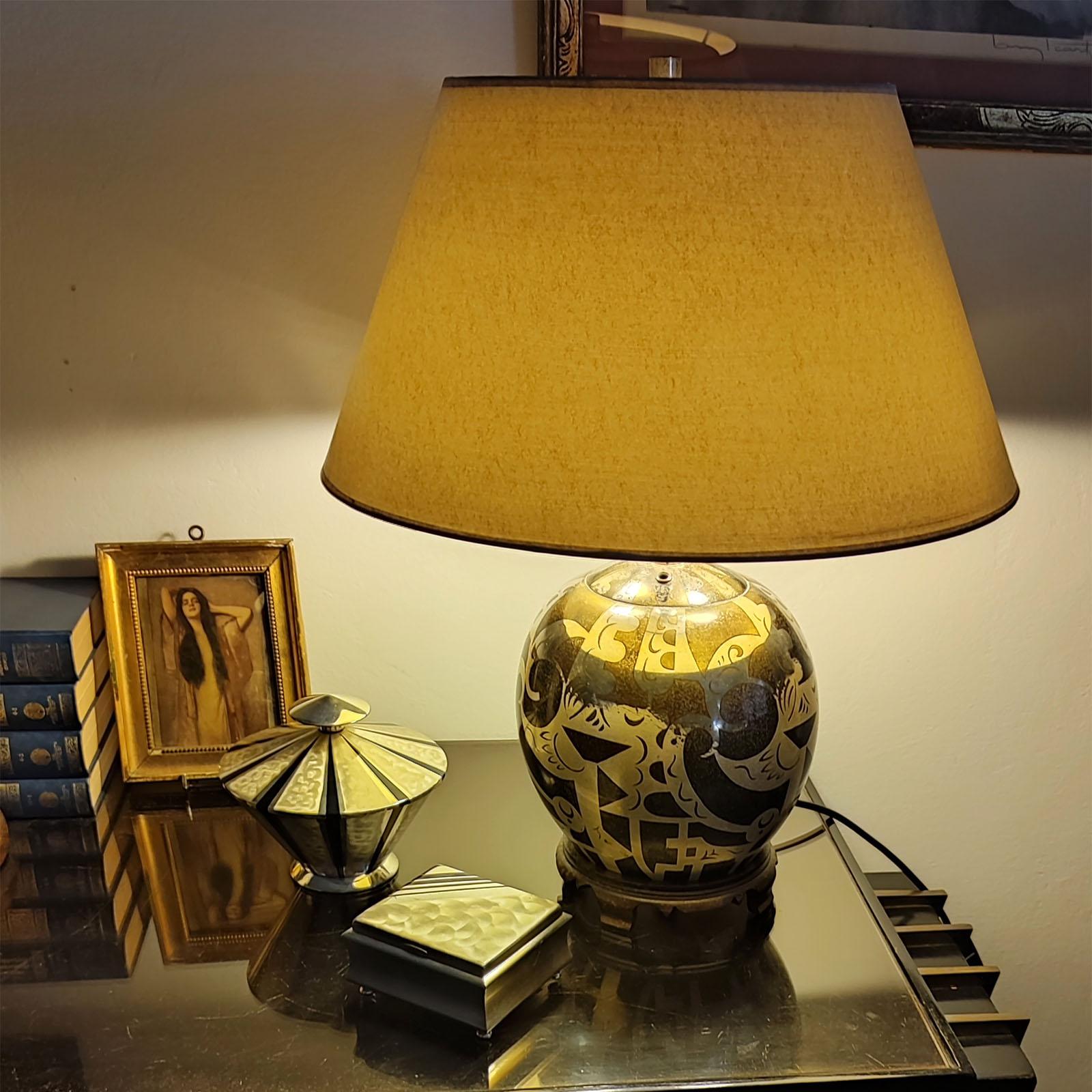 An Art Deco silvered and patinated brass and ivory 