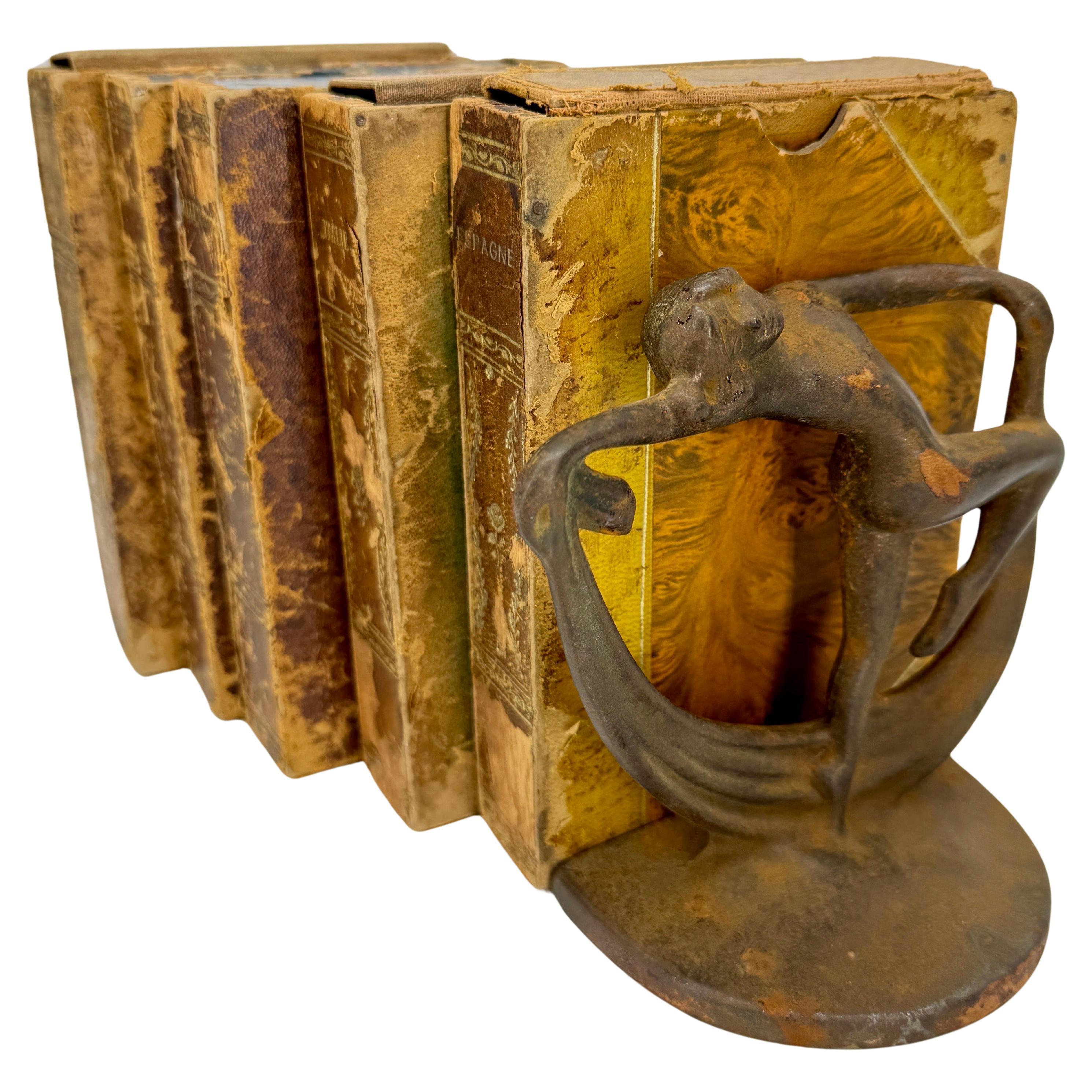 Woman Dancing Art Deco Sculpture Bookend, France

This charming solid cast metal bookend with that Art Deco flair displays stunningly from all angles. Certainly makes a gorgeous statement in an open bookcase with antique books. Great to use on a
