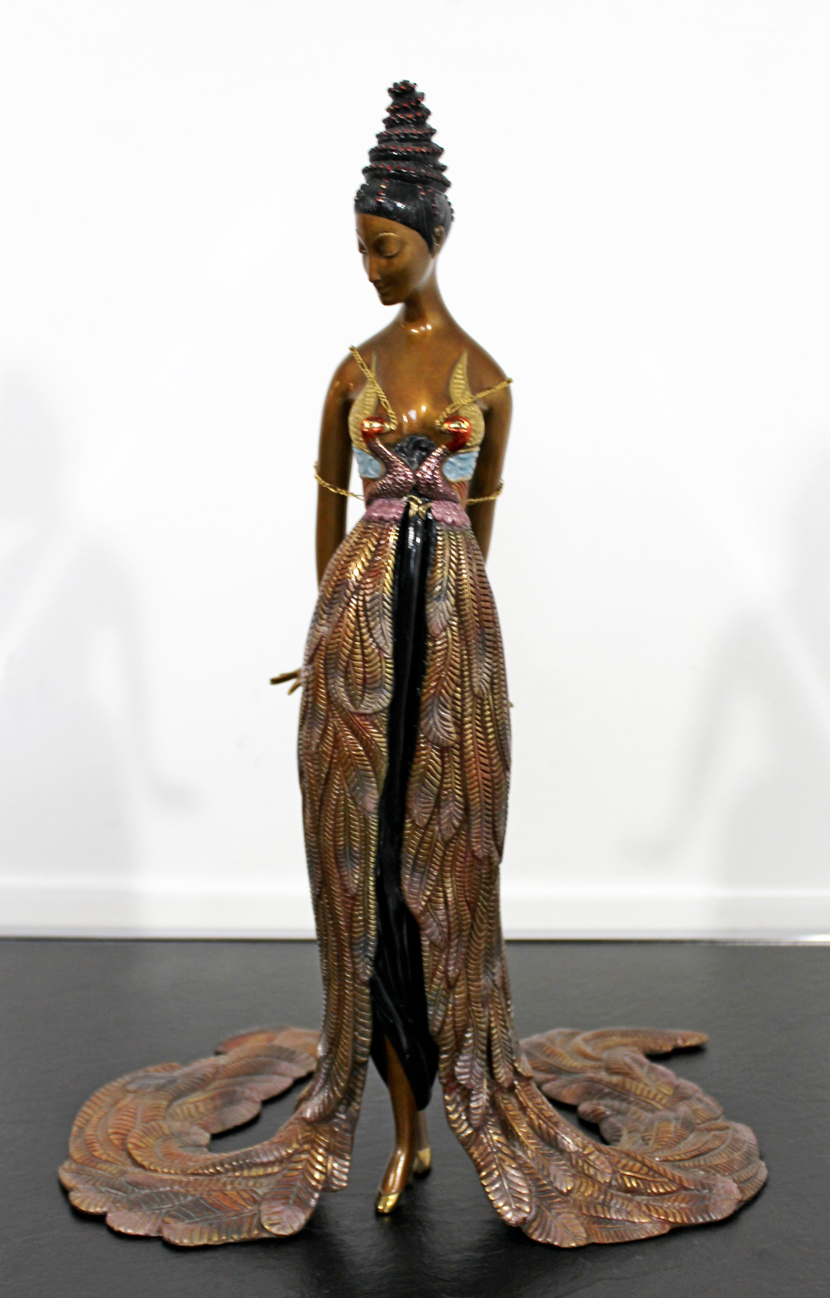 For your consideration is an irresistible bronze table sculpture, of a woman in a feather gown, signed by Erte, numbered 292/375. In excellent condition. The dimensions are 12