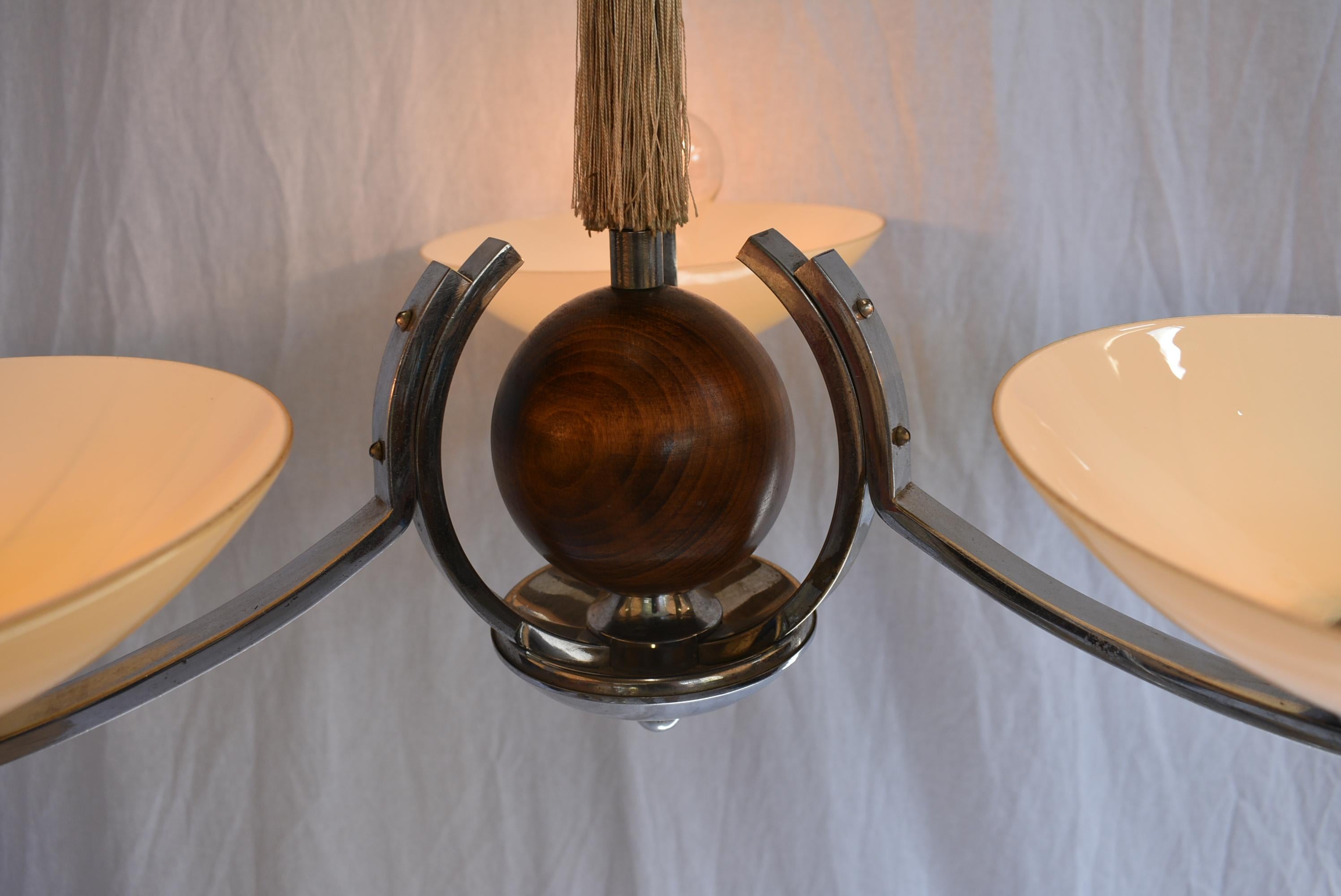 3-flamming chandelier in Art Deco style. Chrome and wood repolished. 3x60W, E27 or E26 bulbs. Good condition.