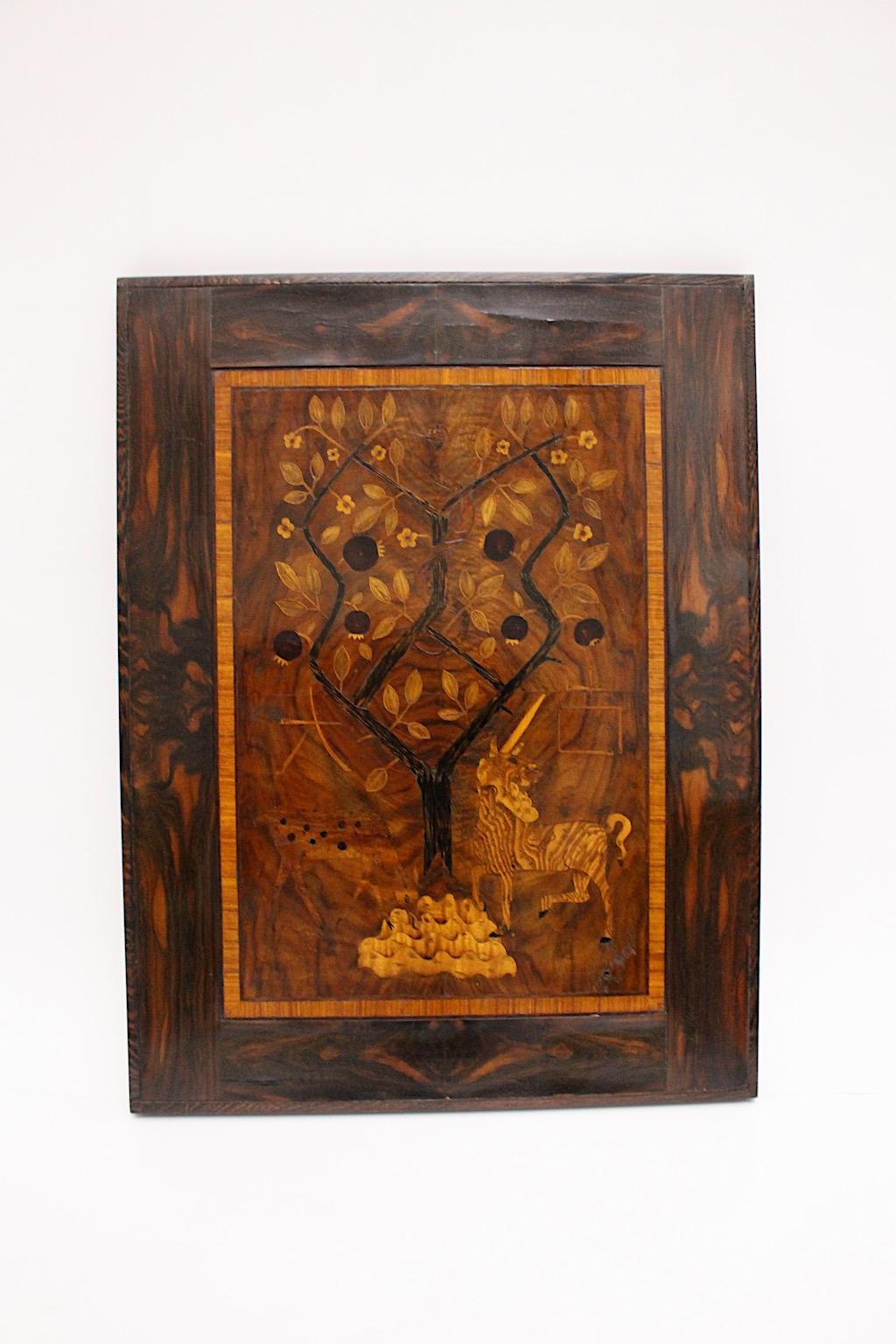Art Deco vintage wood inlaid picture or wall panel in the of style of Victor Lurje 1920s, Austria.
A stunning wooden inlaid picture in the style of Victor Lurje 1920s with fairytale motif unicorn and fabulous animal under pomegranate tree in the