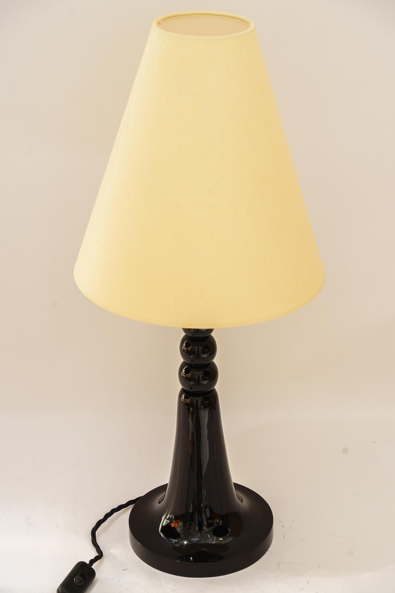 Art Deco wood table lamp vienna around 1930s with fabric shade
Beech wood blackened and polished
Partly chromed 