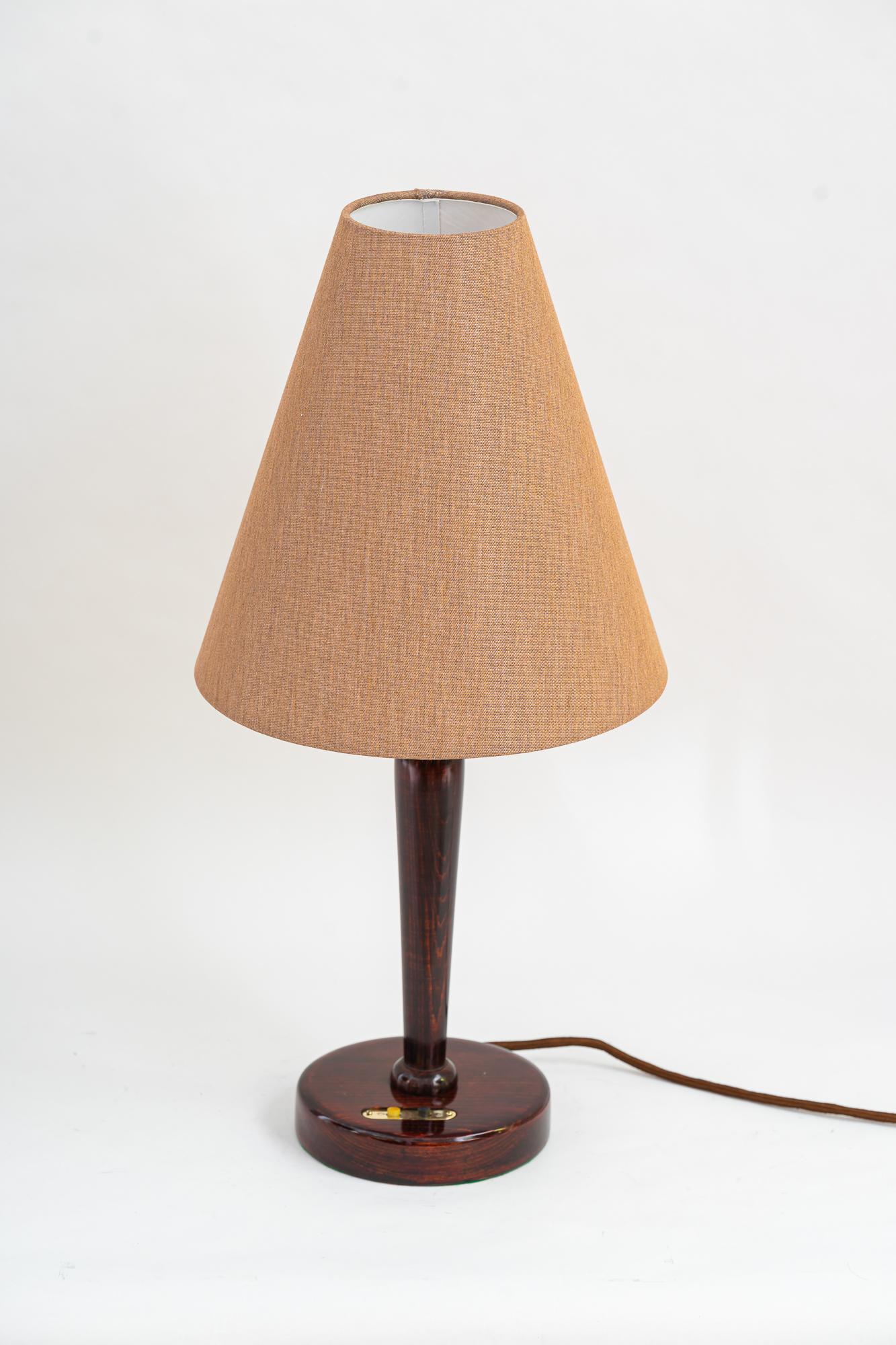 Art Deco wood table lamp with fabric shade vienna 1920s
Wood polished
The fabric shade is replaced ( new ).